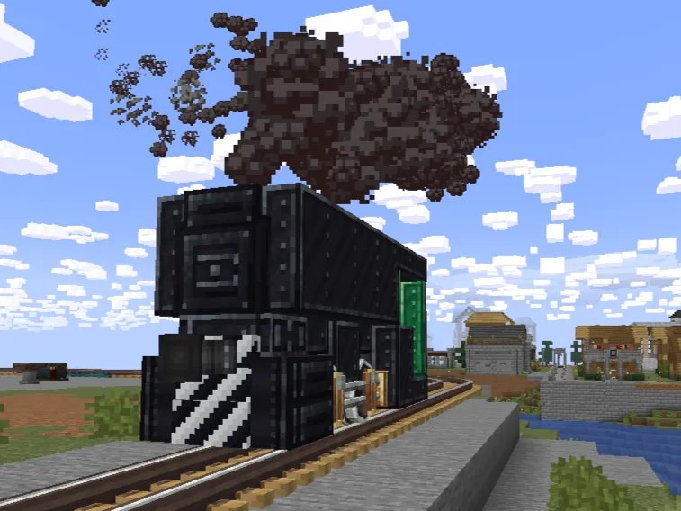 Black steam locomotive moving on tracks while emitting thick clouds of smoke