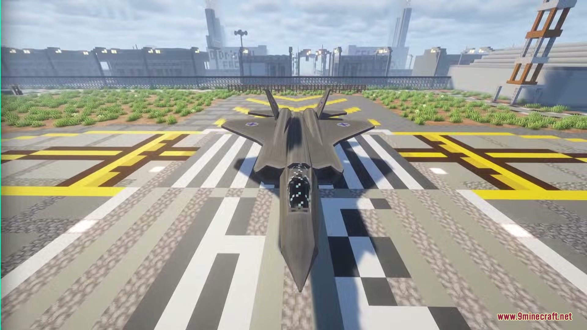 SBW Nearth Armory Mod Screenshot 1 A sleek dark grey fictional fighter jet parked on a detailed Minecraft runway