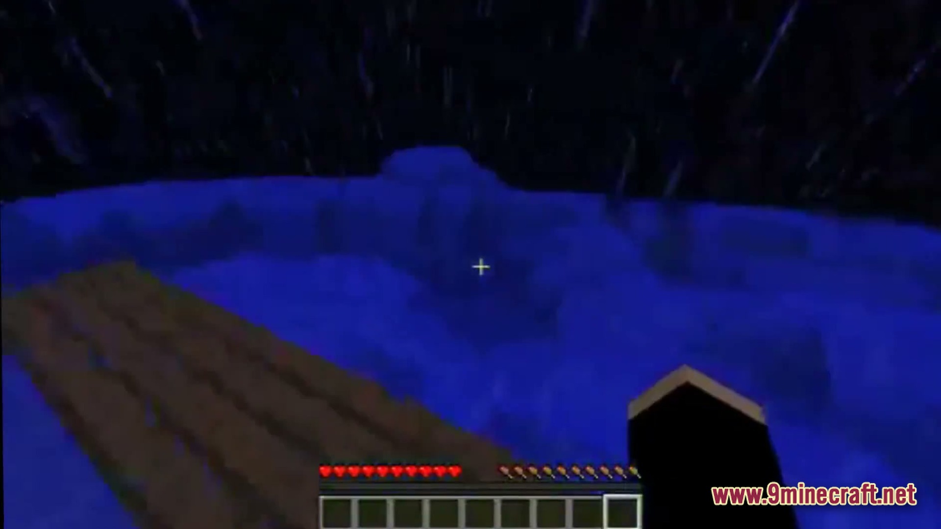 Saltwater Chronicles Modpack Screenshot 5 A player stands on a wooden platform amidst a dark, rainy ocean at night