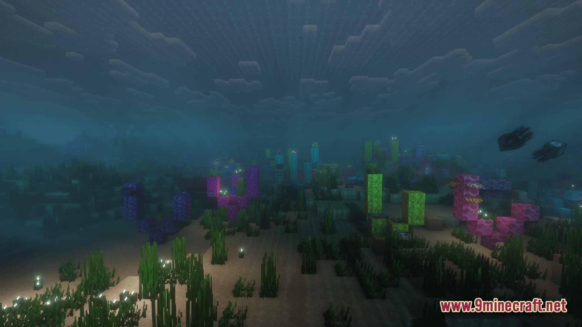 Saltwater Chronicles Modpack Screenshot 9 An underwater coral reef biome featuring colorful coral blocks, seagrass, and swimming squid mobs