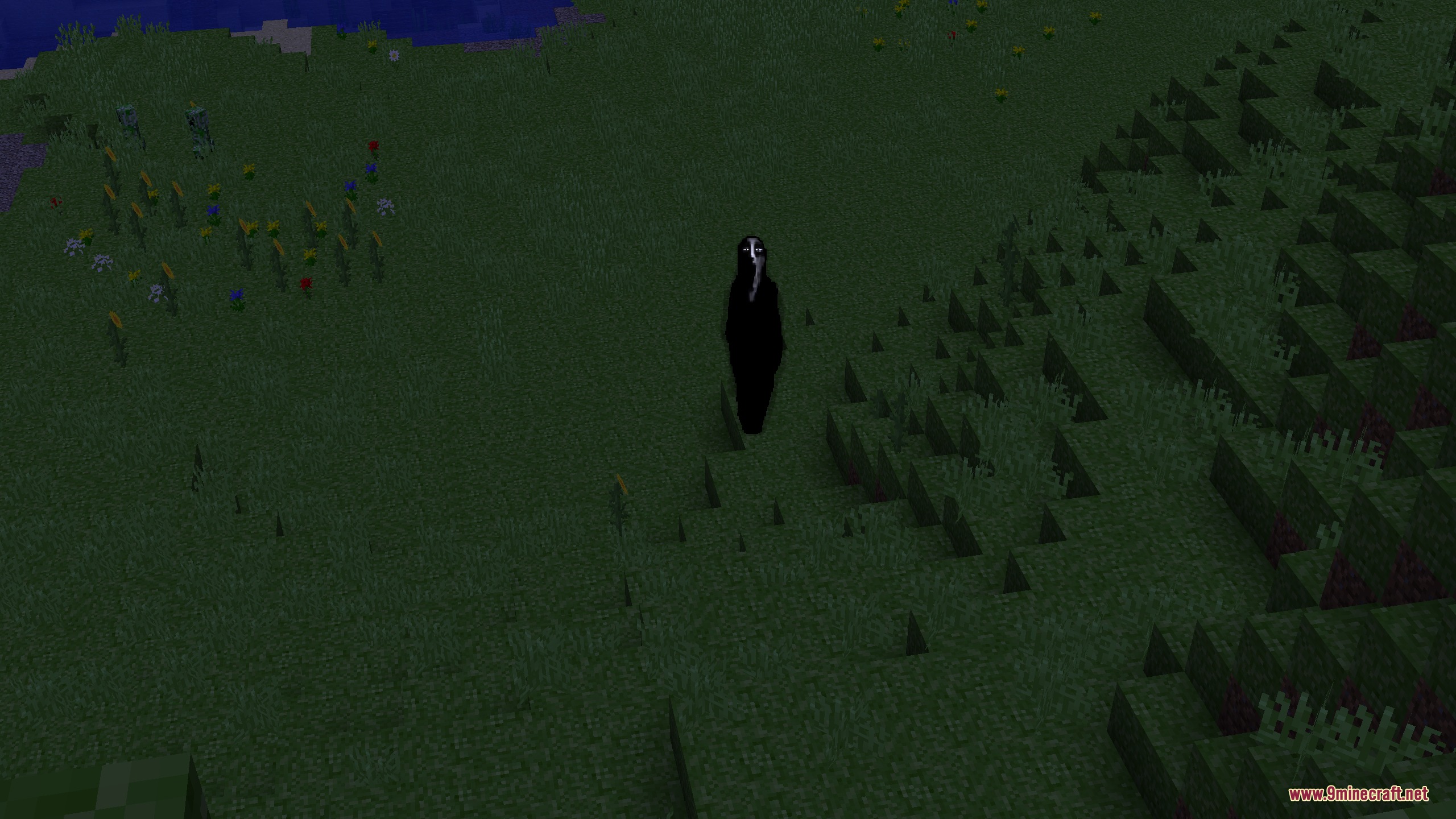 Sentient Circuitry Resource Pack Screenshot 1 Sentient Circuitry adds a tall shadowy entity with an eerie white face