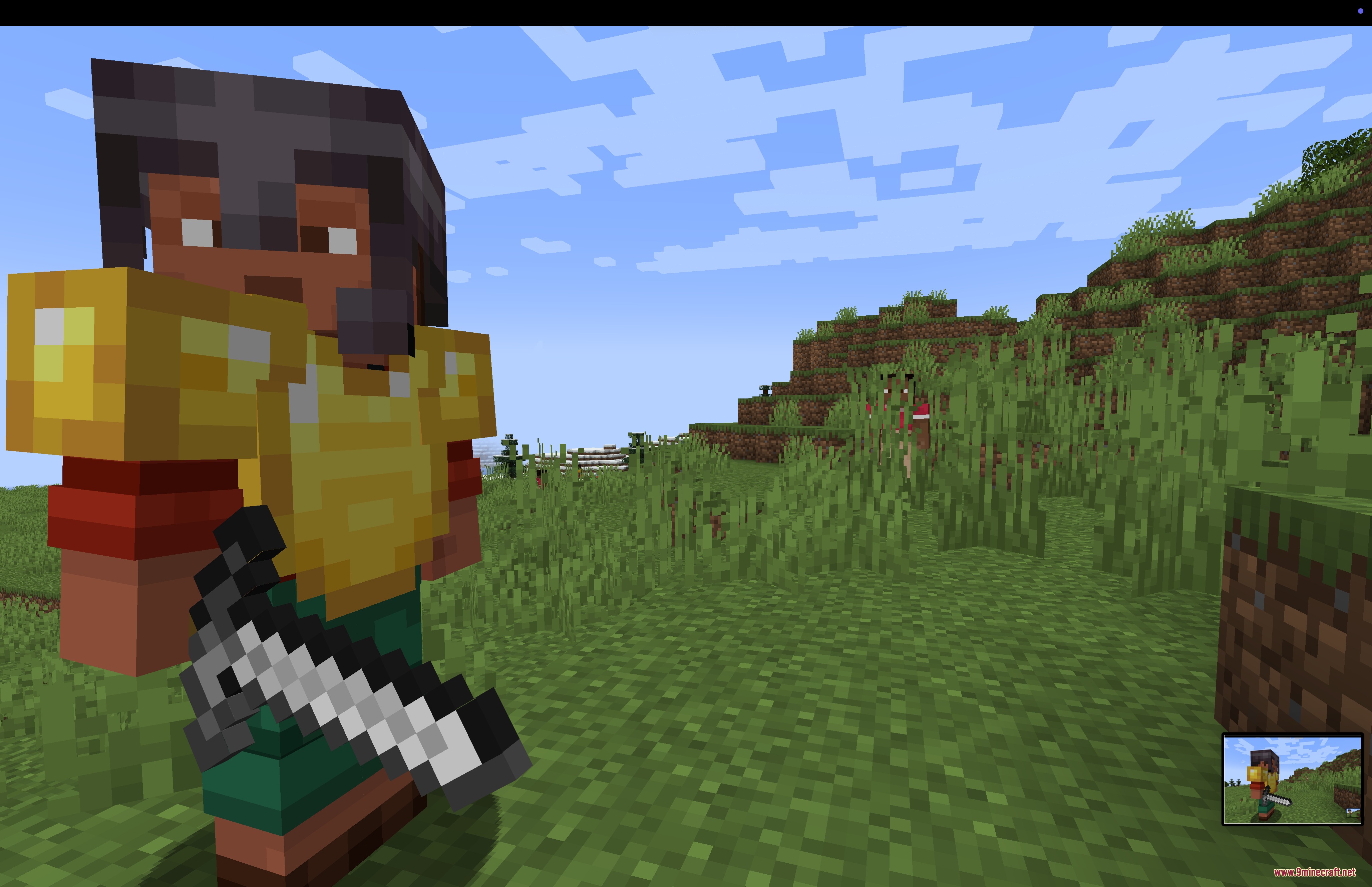 A humanoid mob wearing golden armor and holding a sword in a field