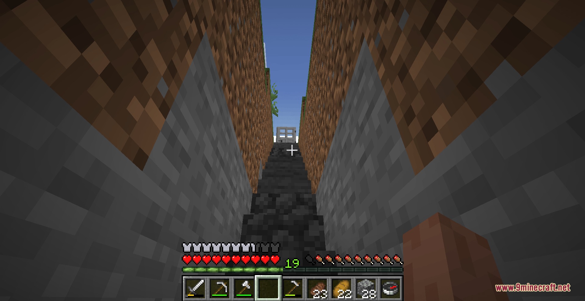 Shattered Script Echoes Mod Screenshot 4 Looking up a narrow stone staircase leading toward an iron door