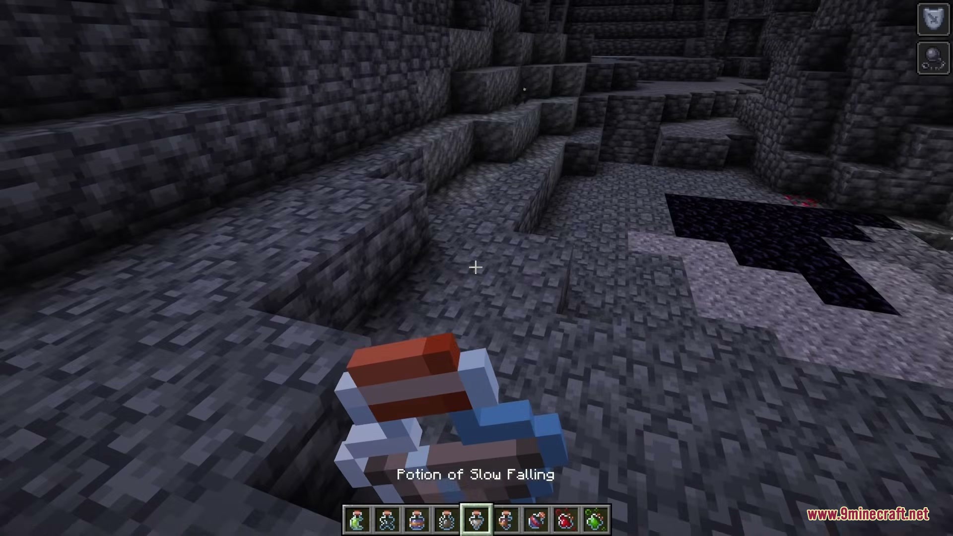 Shureee's Block Icons Resource Pack Screenshot 3 Minecraft player holding a Potion of Slow Falling with a feather badge icon