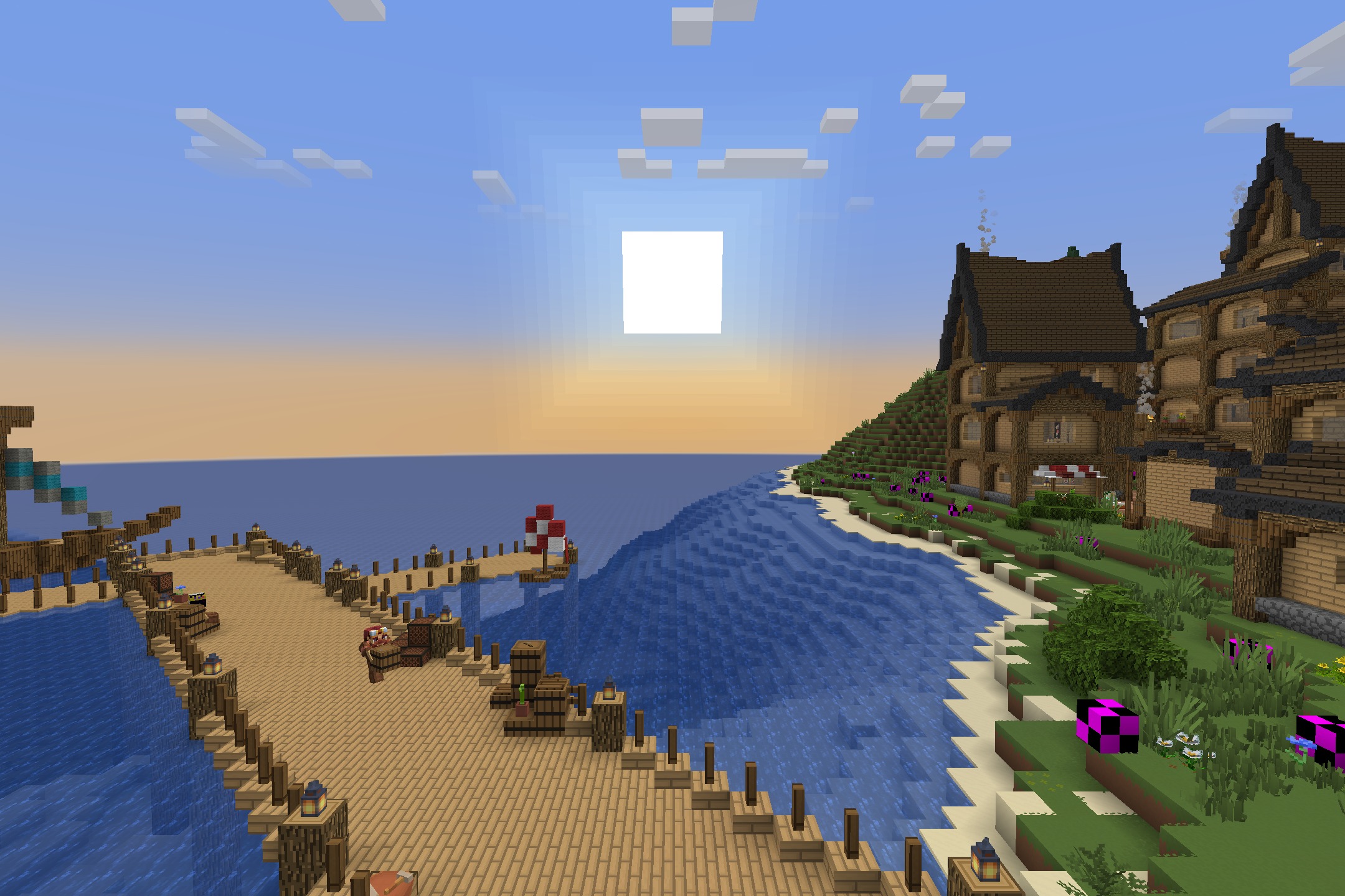 Soft colors on a wooden dock and coastal village during a bright sunset