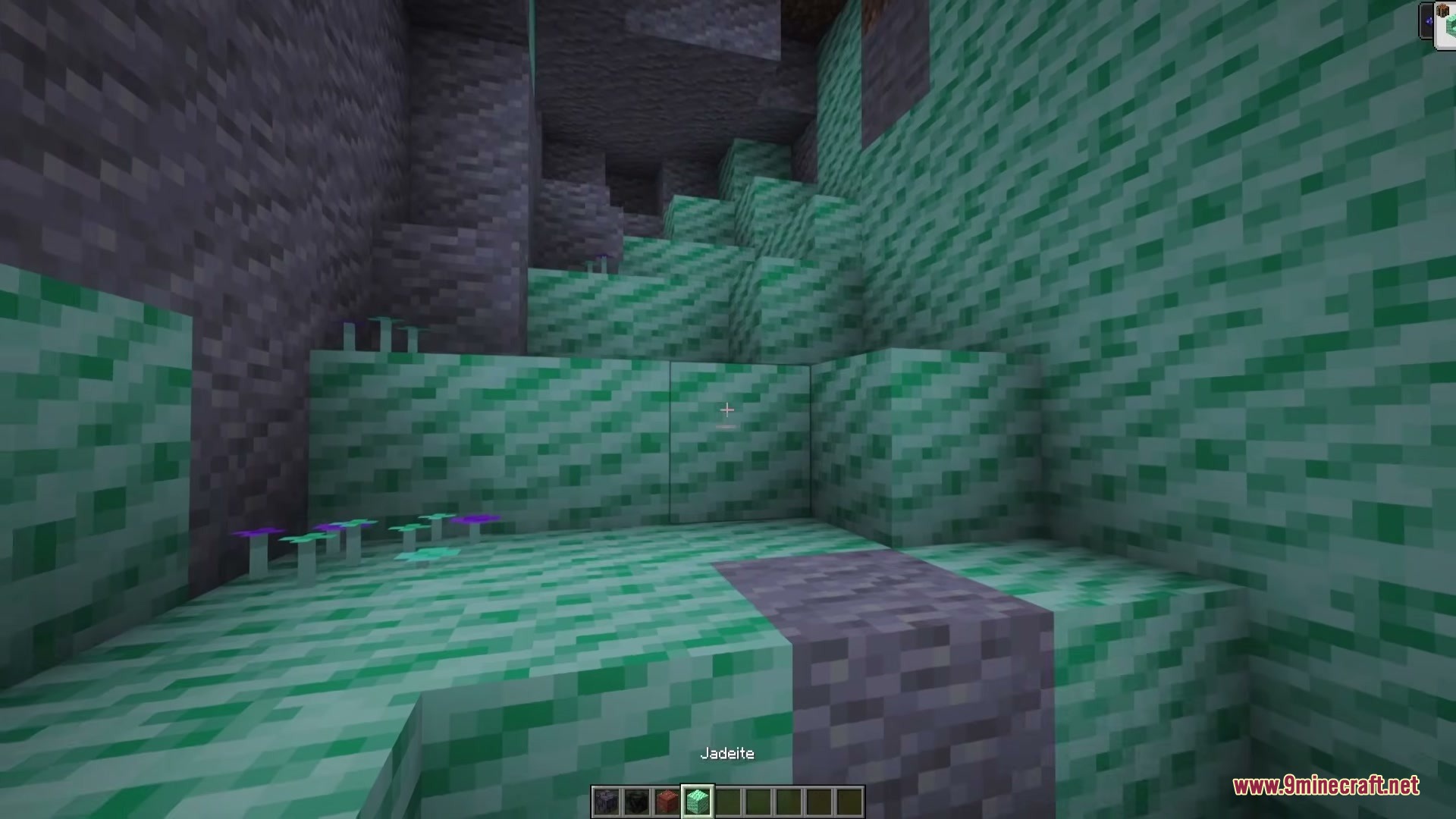 Simply Cave Biomes Mod Screenshot 3 Mint green Jadeite blocks and small cave blooms decorate an underground cavern