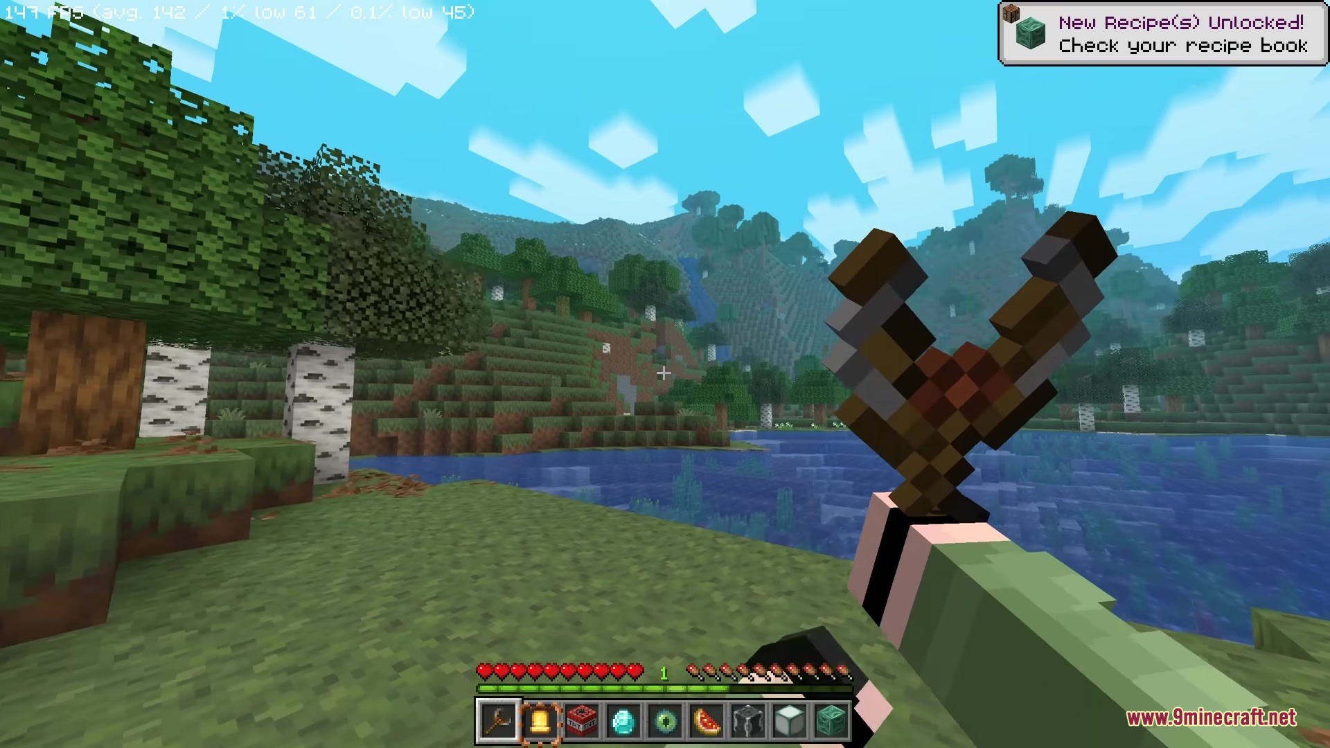 Simply Slingshot Mod Screenshot 1 A player holding a weapon from the Simply Slingshot mod in Minecraft
