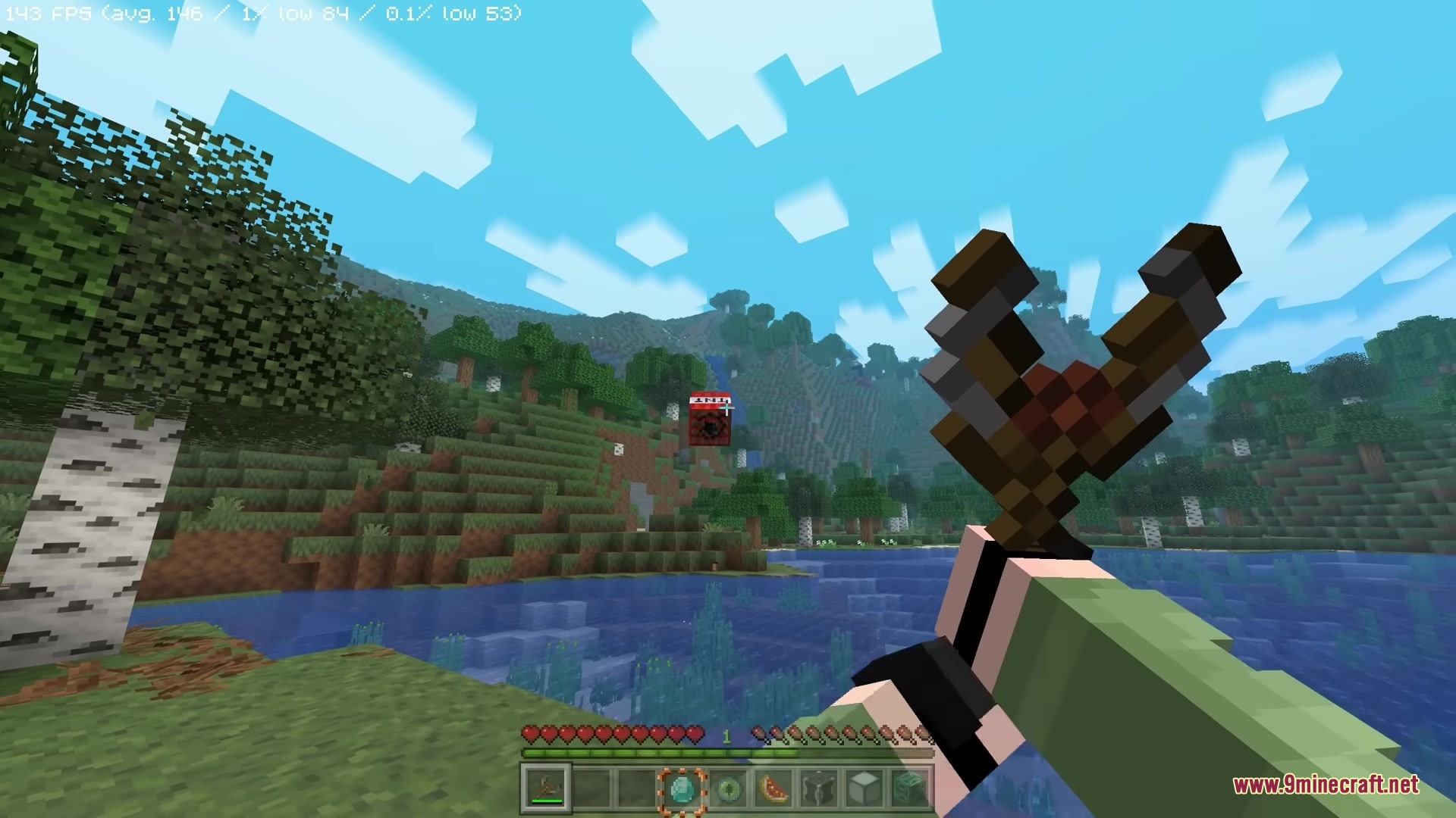 Simply Slingshot Mod Screenshot 2 Aiming a slingshot with a red trajectory marker at a distant hillside