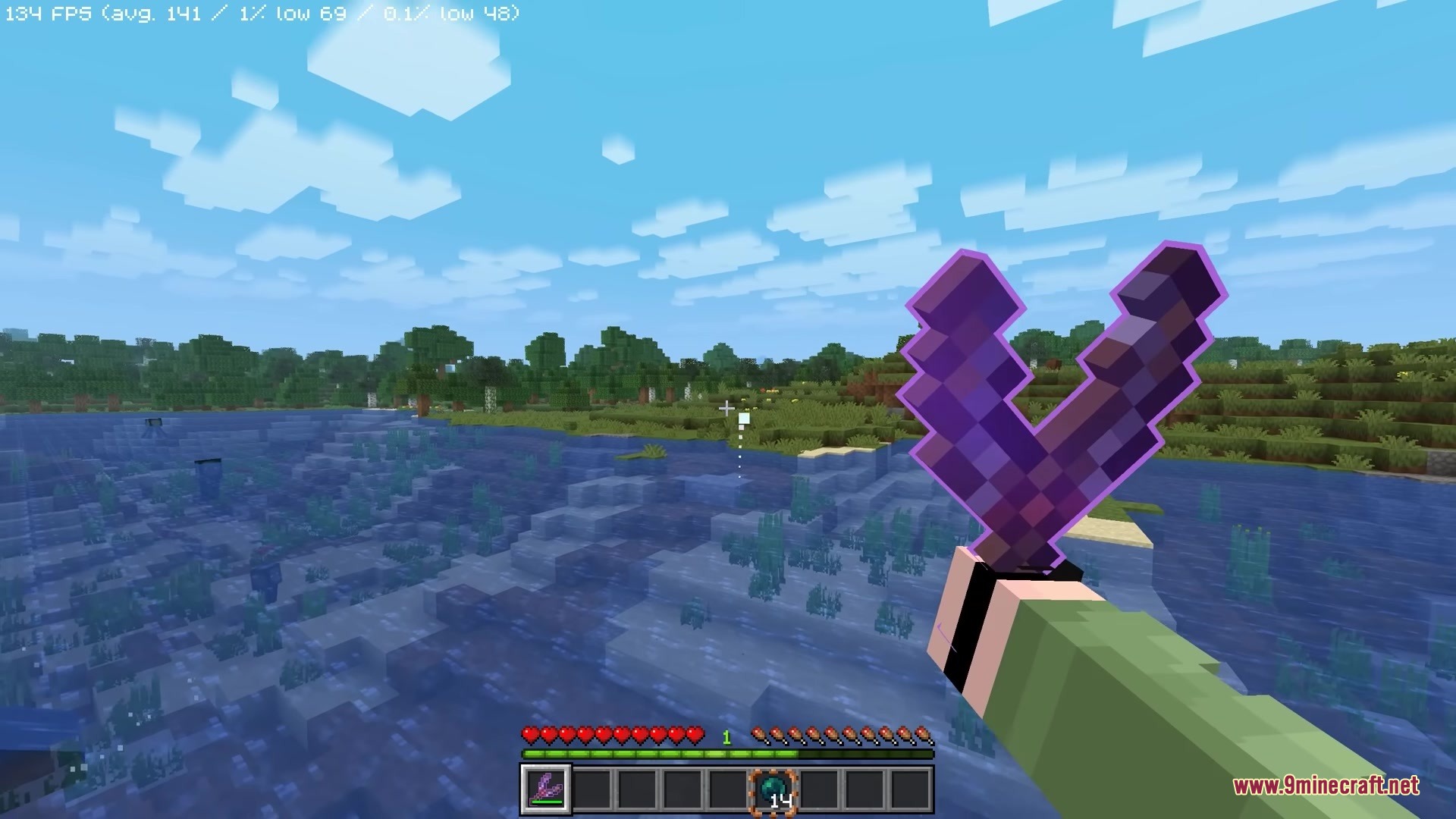 Simply Slingshot Mod Screenshot 9 A player holds the Simply Slingshot weapon while aiming at the water