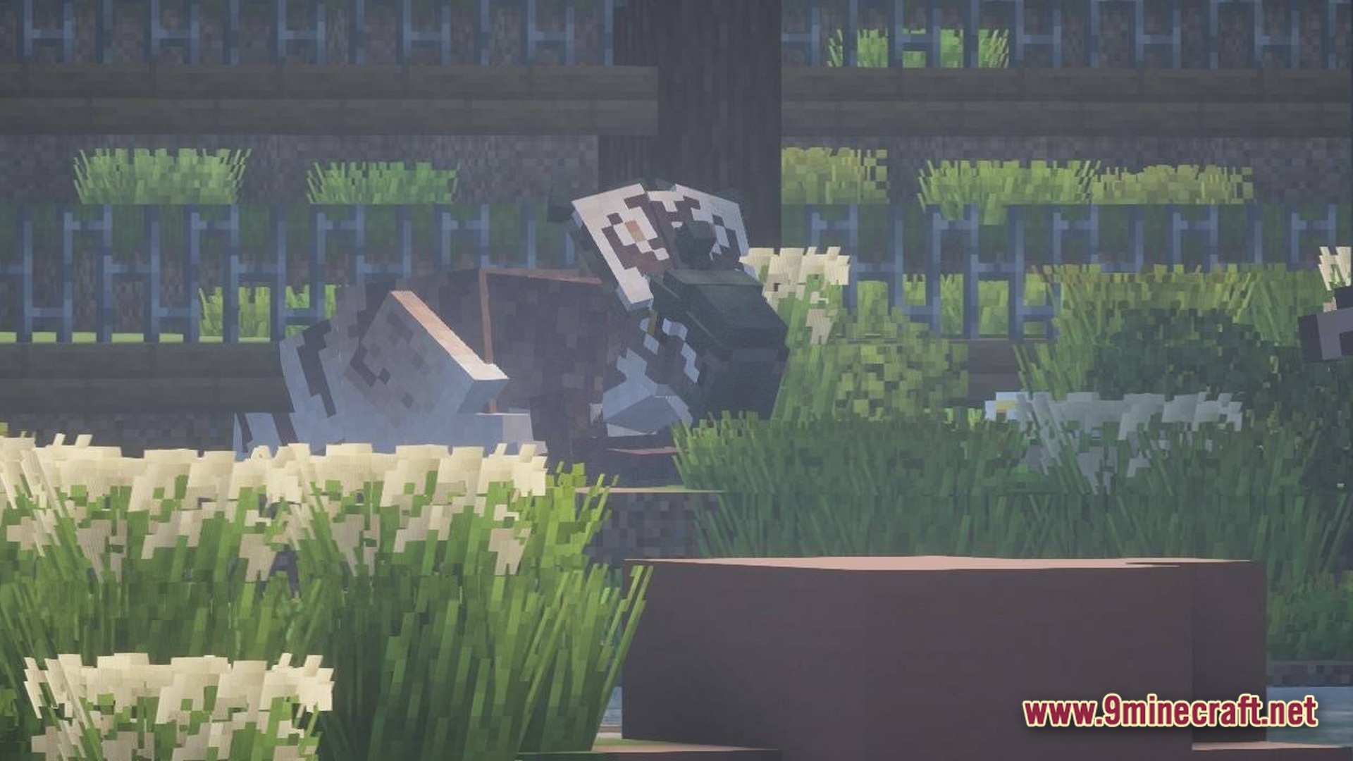 Sinothe Dino's Dinosaurs Modpack Screenshot 10 A patterned dinosaur stands behind tall grass and flowers within a fenced enclosure