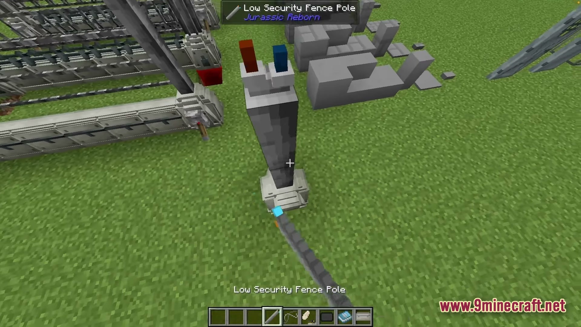 Sinothe Dino's Dinosaurs Modpack Screenshot 6 A Low Security Fence Pole from the Jurassic Reborn mod placed on a grass biome