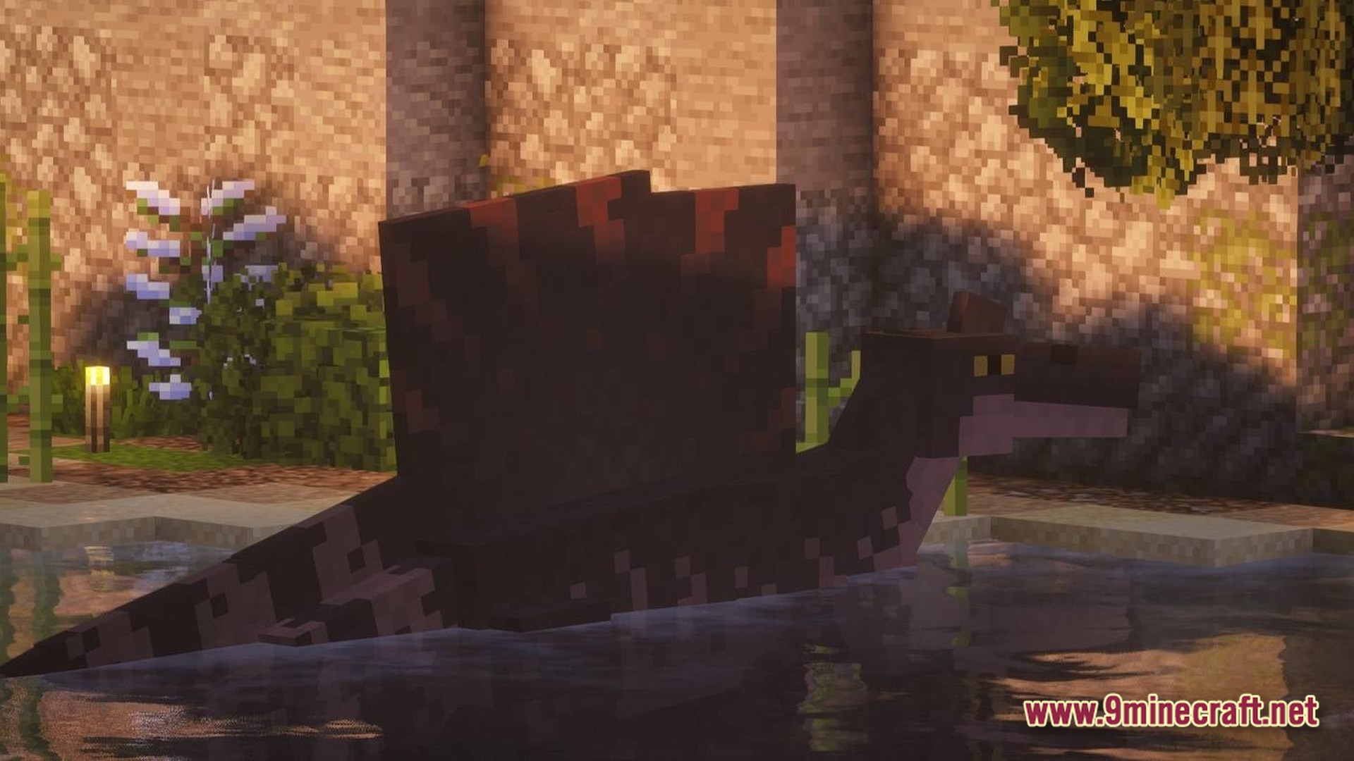 Sinothe Dino's Dinosaurs Modpack Screenshot 7 A Spinosaurus swimming in a pond next to a stone wall and lush green foliage