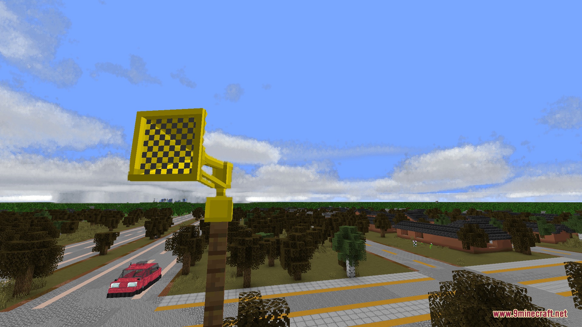 Sirencraft Mod Screenshot 1 A yellow air raid siren mounted on a tall pole overlooking a town