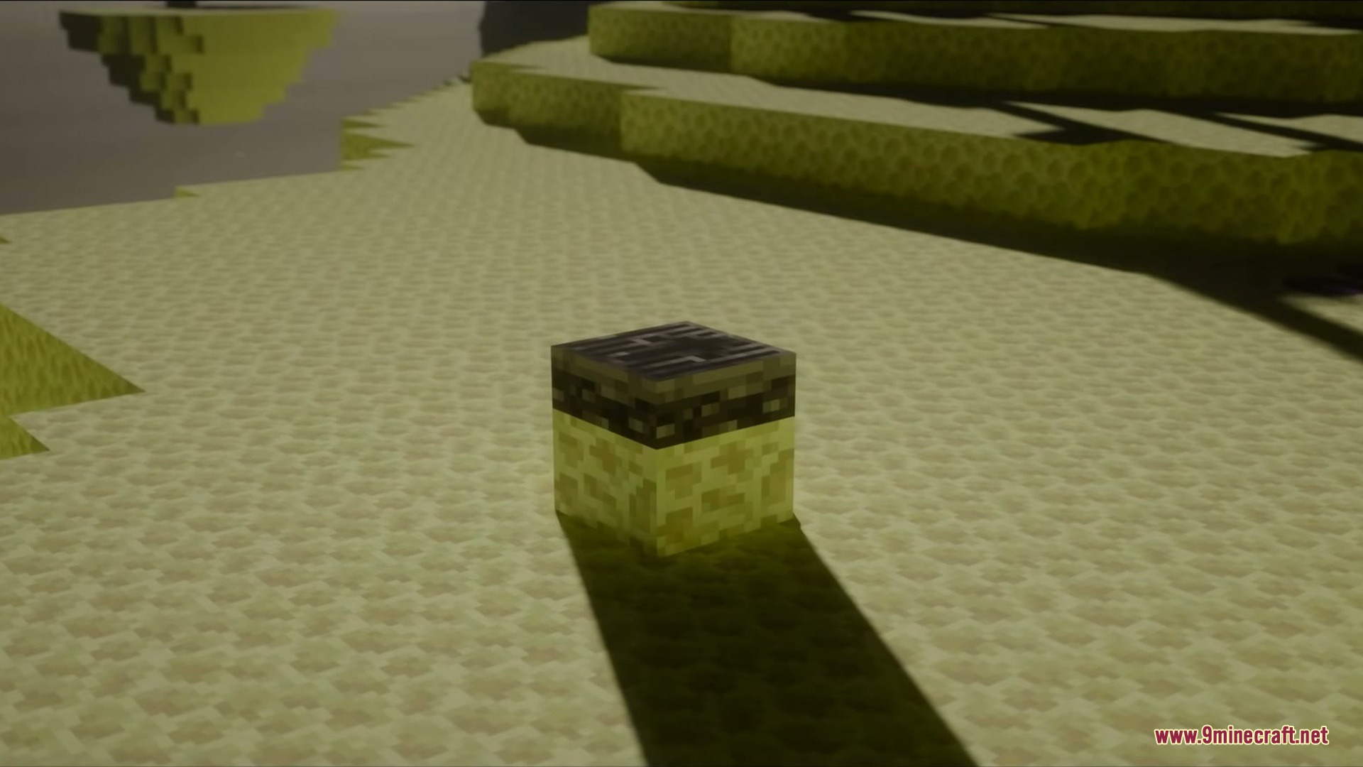 A lodestone block sits on end stone in the vast End dimension landscape