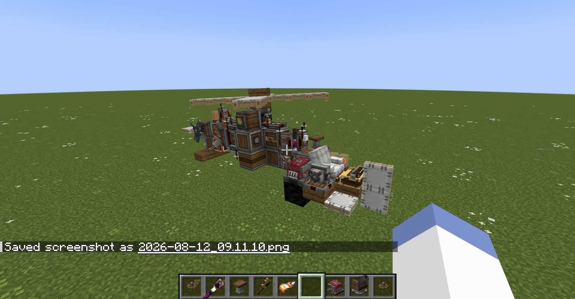 Side view of a small mechanical helicopter built on a flat world