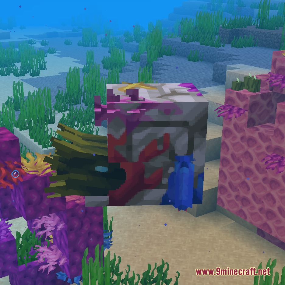 SnapshotXBR Resource Pack Screenshot 3 A pufferfish swimming near vibrant coral reefs in the deep blue ocean