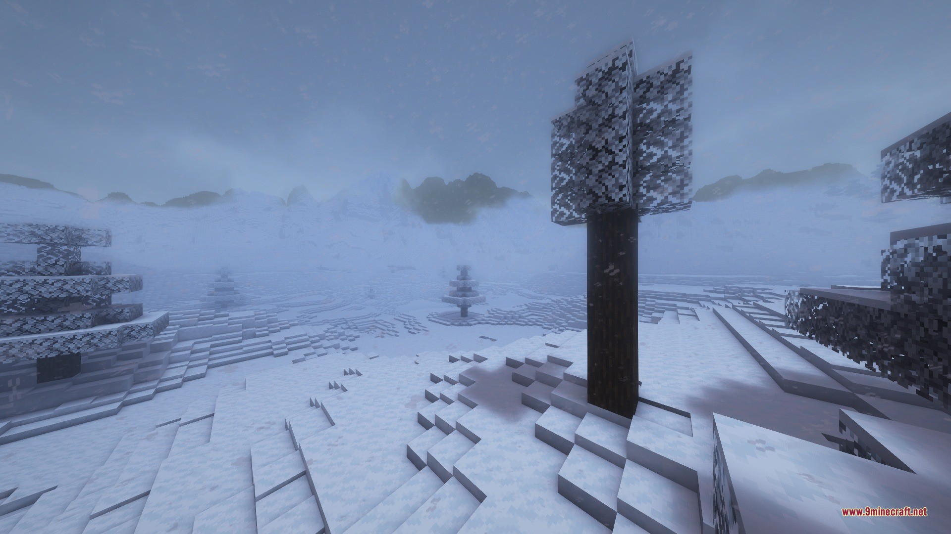 Snowy Biomes Enhanced Data Pack Screenshot 2 White tree leaves and smooth snow layers cover the foggy winter landscape