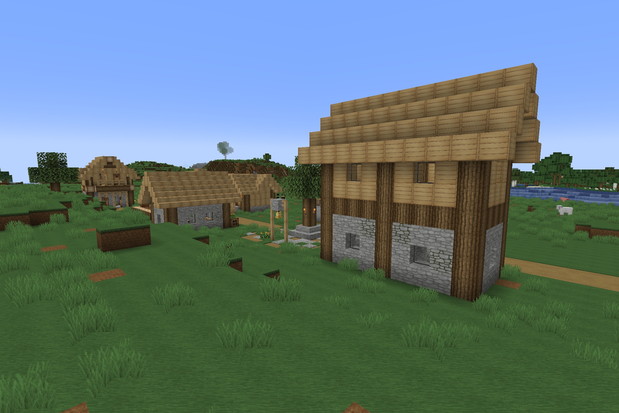 Soartex_Fanver - Rebirth Resource Pack Screenshot 3 A peaceful village showcasing the clean textures of Soartex Fanver Rebirth pack