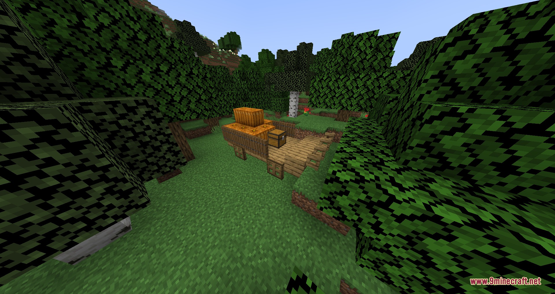 Solidified Horizons Mod Screenshot 7 A wooden cart filled with pumpkins and a chest in a forest