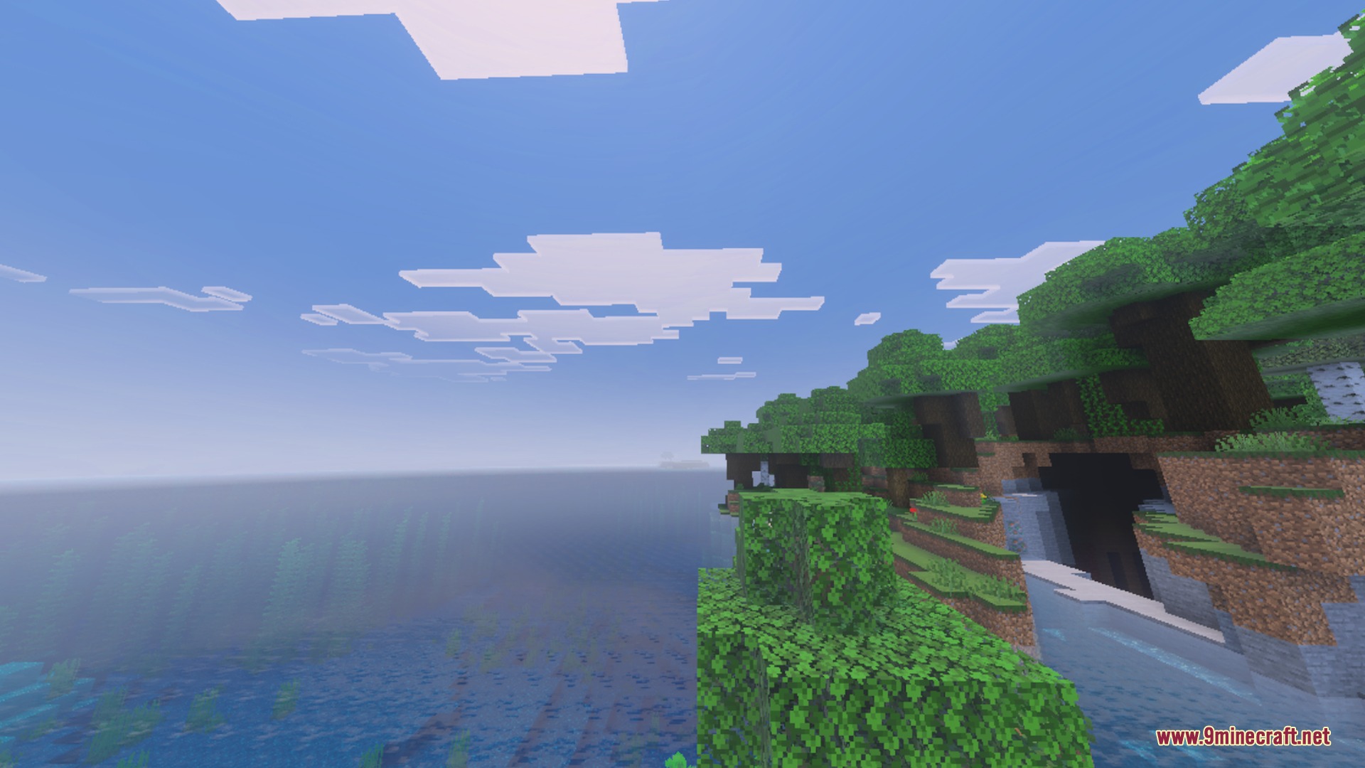 Spectral Horizons Shader Screenshot 1 Bright and colorful coastal scenery with lush green trees and blue water