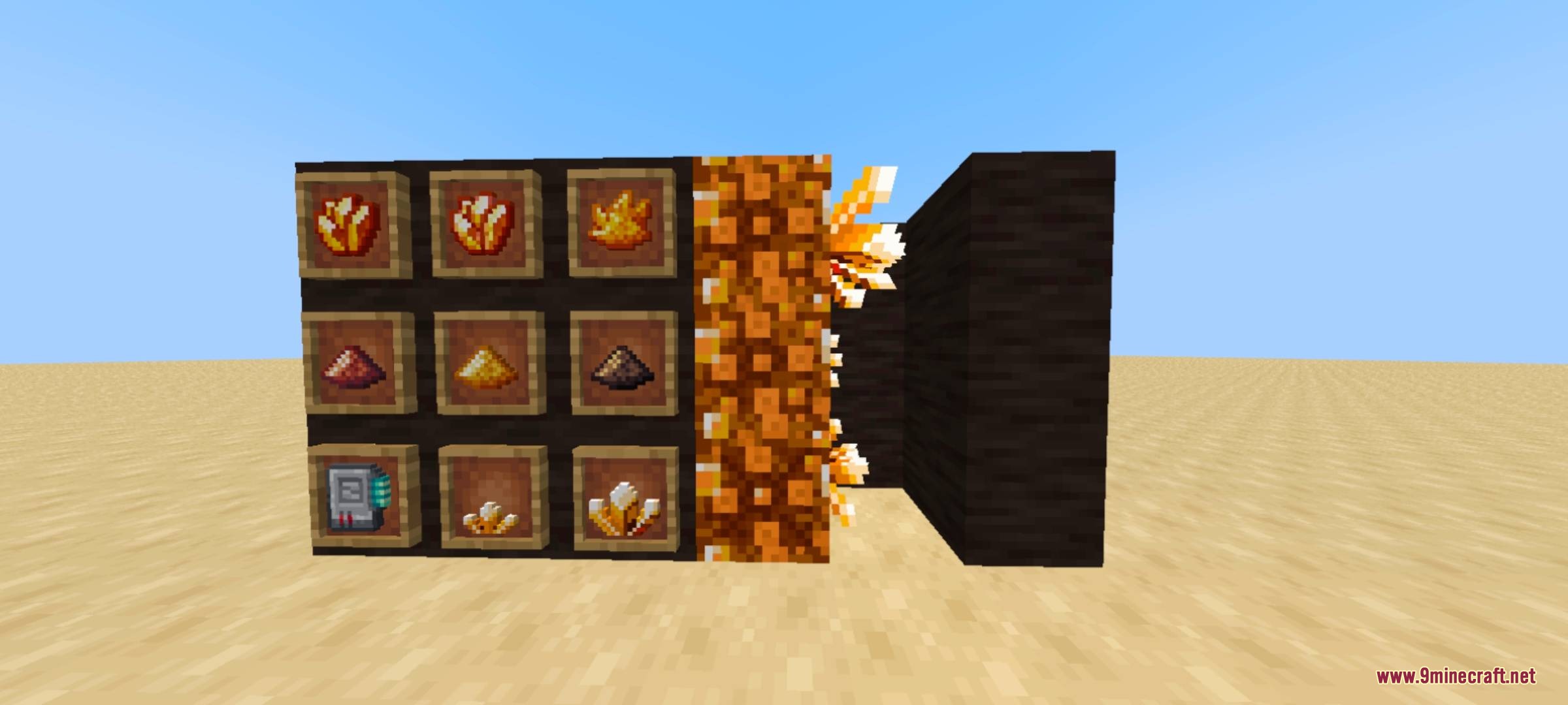 Crystals and machine components shown next to a glowing orange crystal block