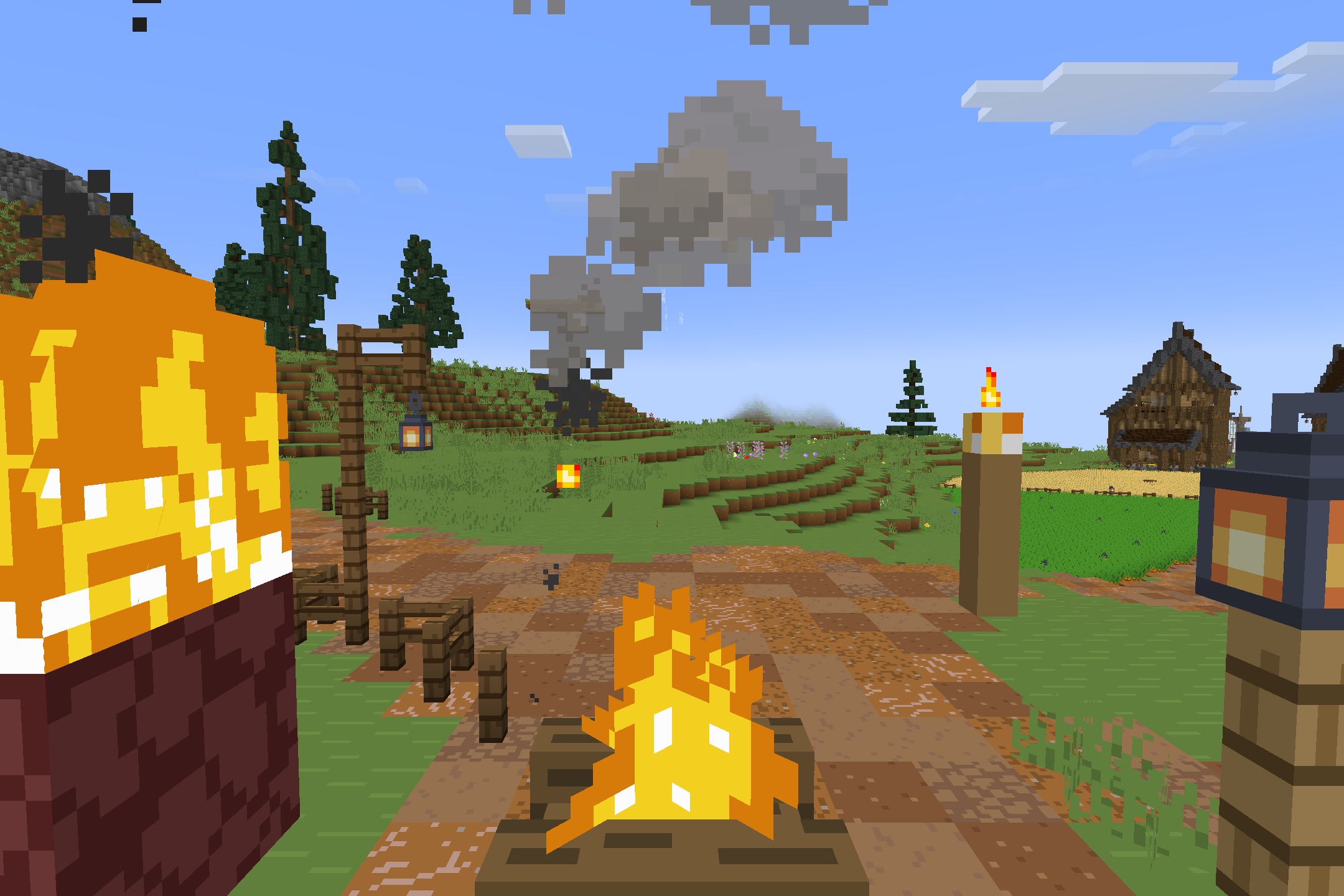 Starboyz2743 PvP Pack Resource Pack Screenshot 8 Campfires and lanterns decorate a village path in a grassy Minecraft landscape