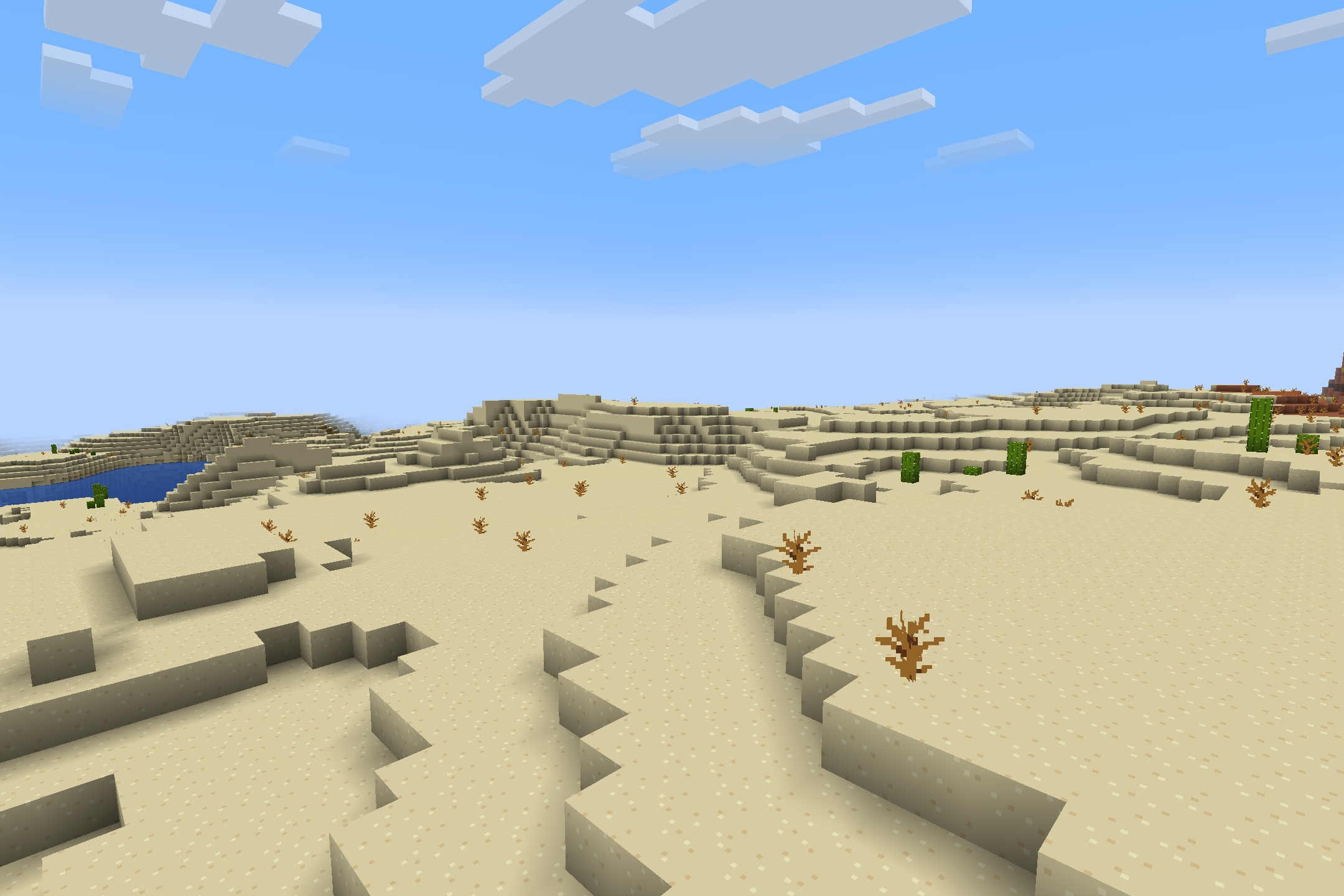 Starboyz2743 PvP Pack Resource Pack Screenshot 9 Vast desert biome with sand dunes cacti and dead bushes under blue sky