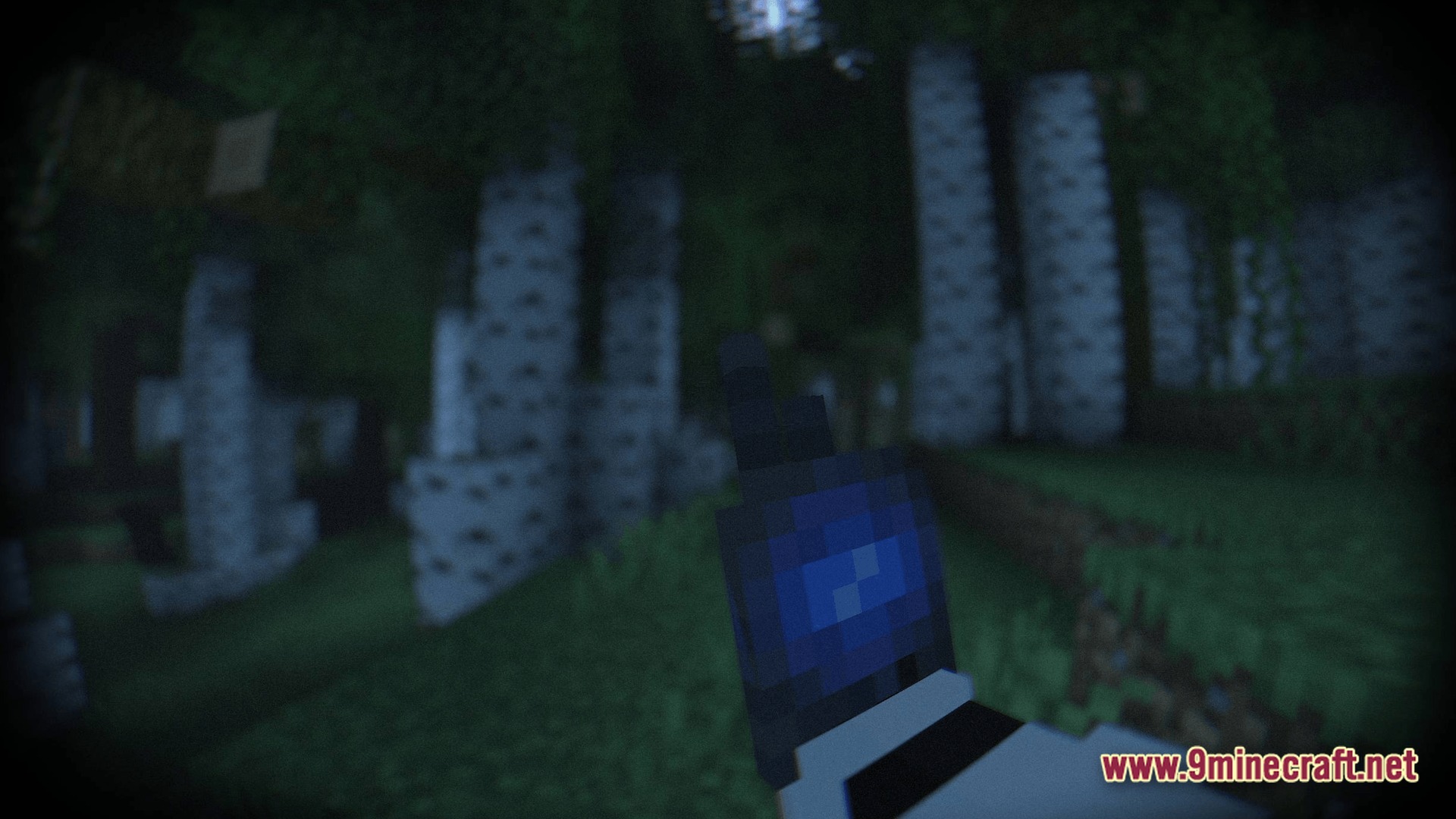 A player holds a blue electronic device while standing in a dark birch forest at night