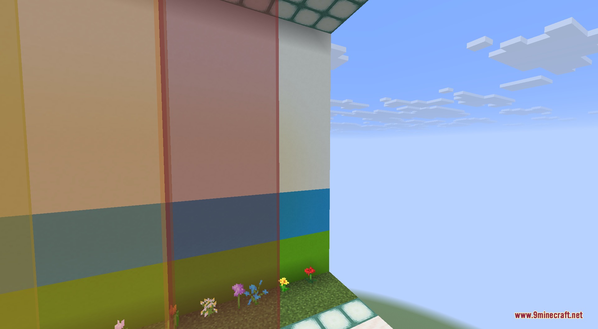 A Minecraft scene featuring clear and borderless stained glass panes on a wall
