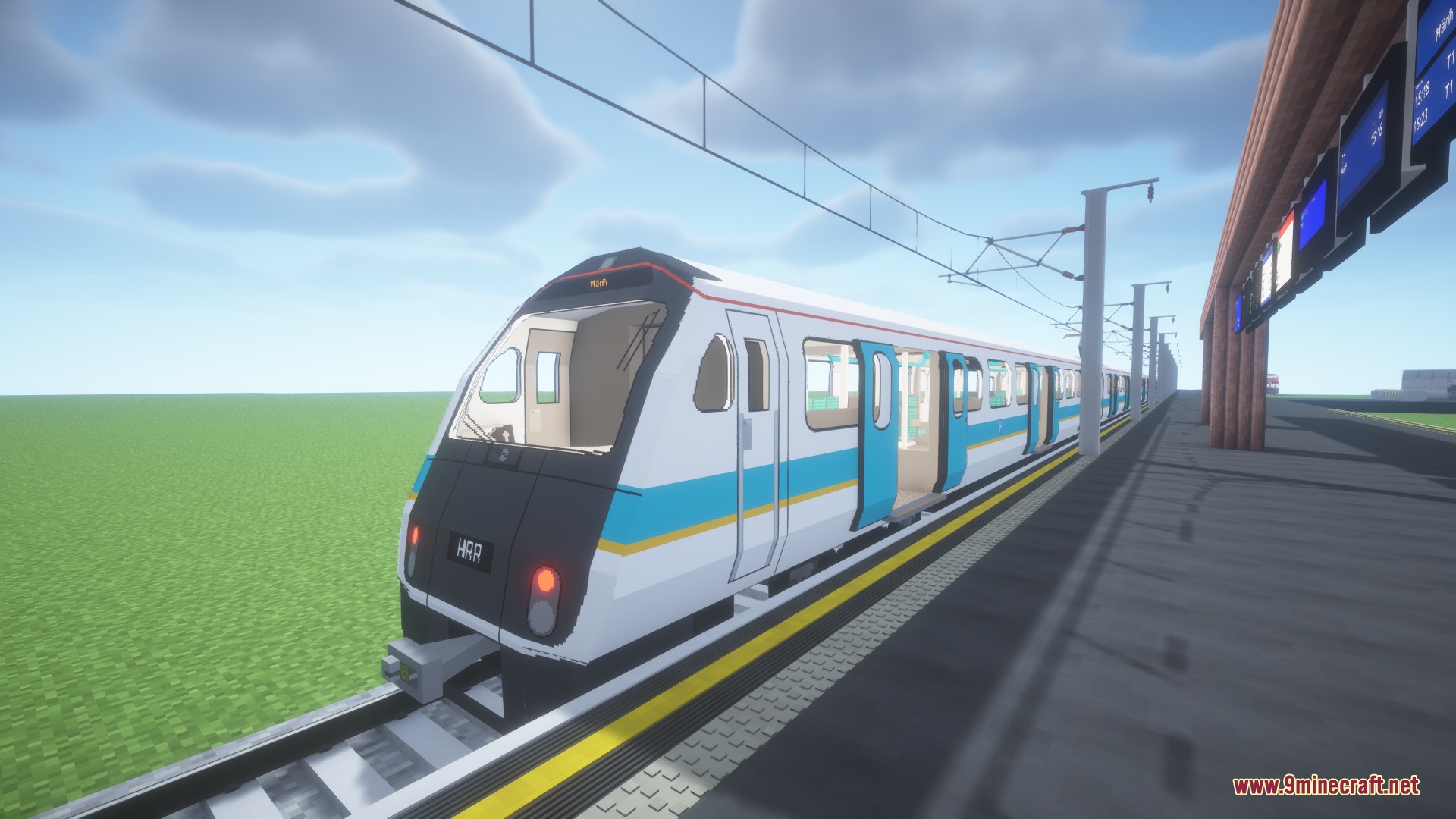 Steel Pulse Transit Resource Pack Screenshot 7 A modern white train with blue stripes stopped at a station platform