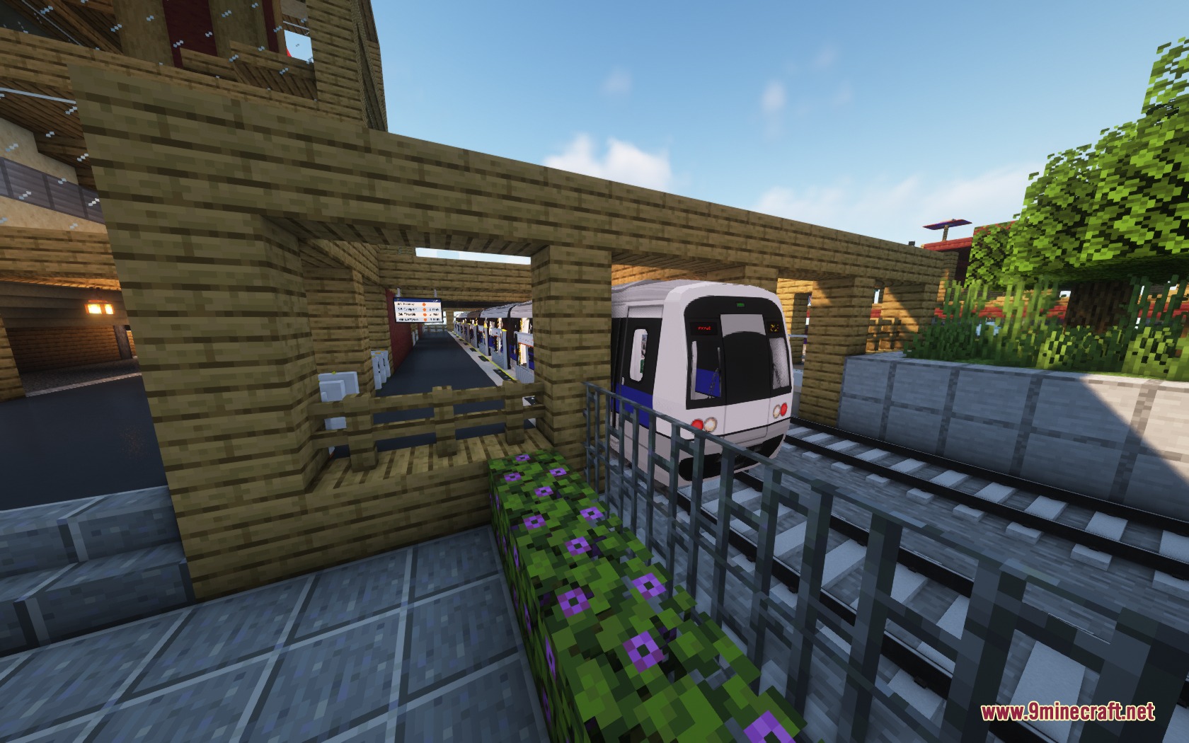 Steel Transit Blueprints Resource Pack Screenshot 1 A white and blue STB Metro train pulls into a wooden station platform