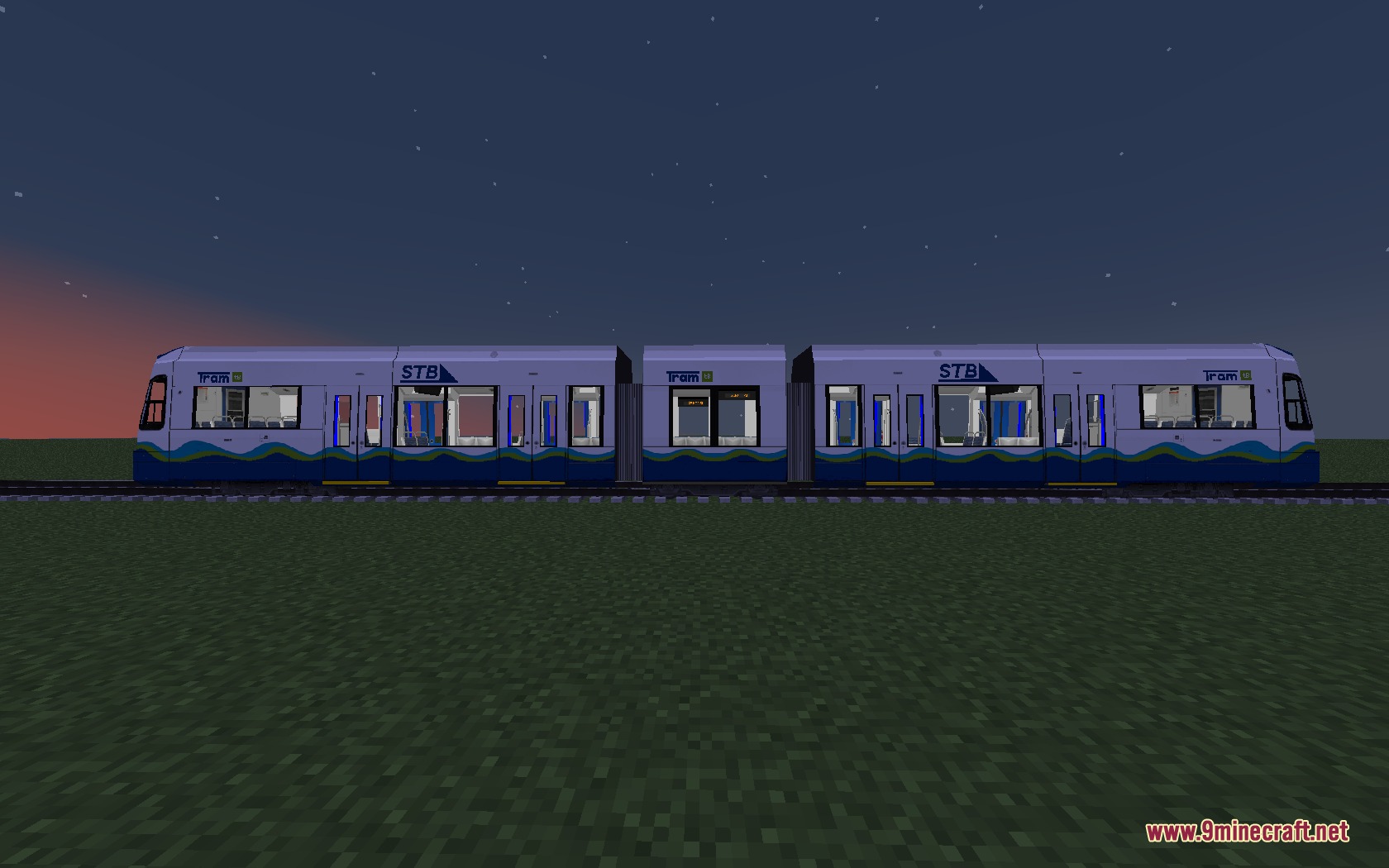 Steel Transit Blueprints Resource Pack Screenshot 3 A blue and white STB tram parked on tracks in a Minecraft world