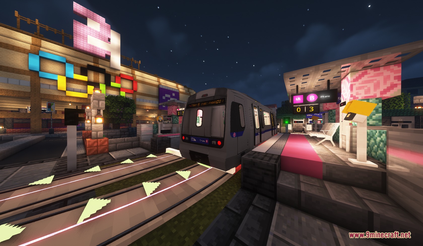 Steel Transit Blueprints Resource Pack Screenshot 8 A modern train arrives at a brightly lit outdoor station at night