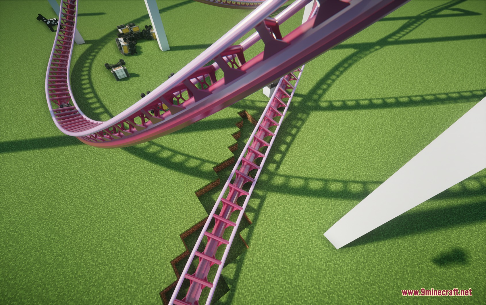 Steelbound Logistics Mod Screenshot 3 A pink roller coaster track curving through a green field in Minecraft