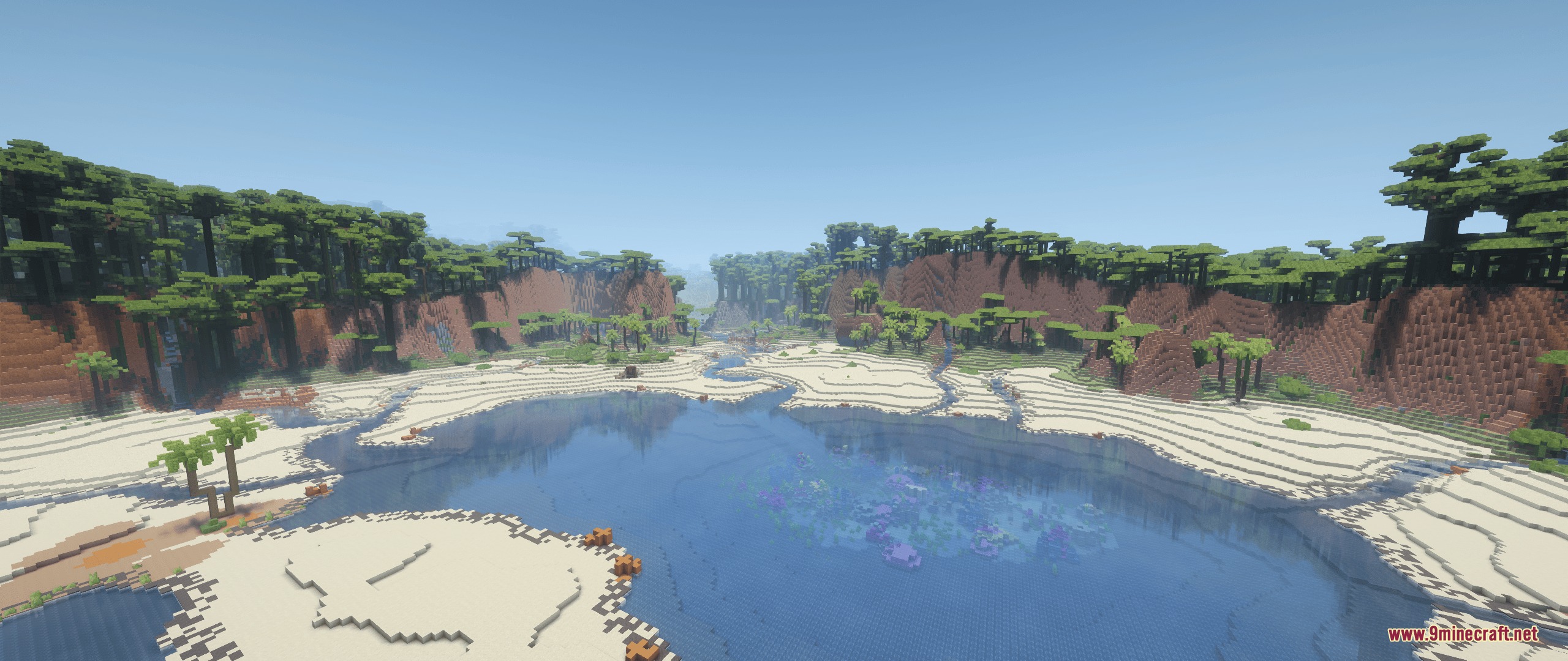 Streams Reflowing Mod Screenshot 2 Clear water flows between sandy banks and red cliffs in a tropical biome