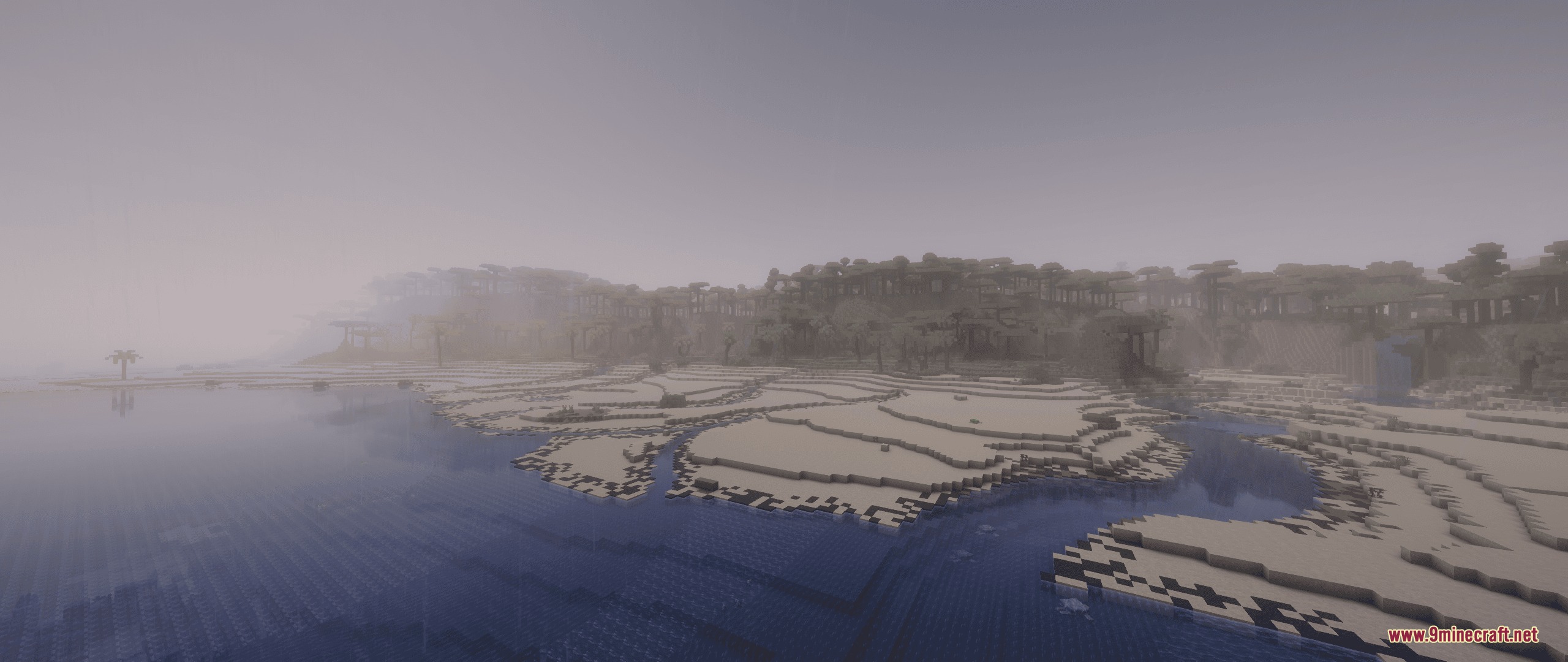 Streams Reflowing Mod Screenshot 5 A foggy Minecraft landscape featuring a winding river and wide sandy banks
