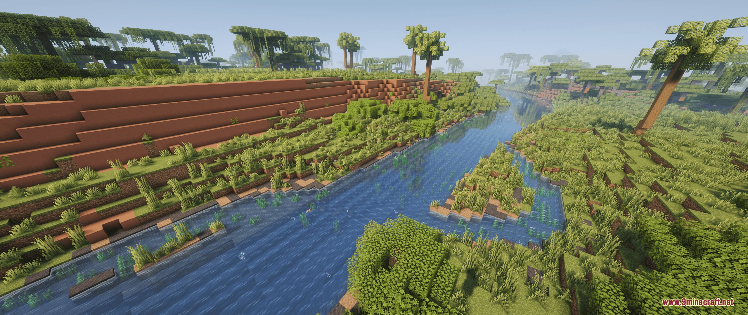 Streams Reflowing Mod Screenshot 8 Realistic water flowing through a lush river valley with tall grass and tropical trees