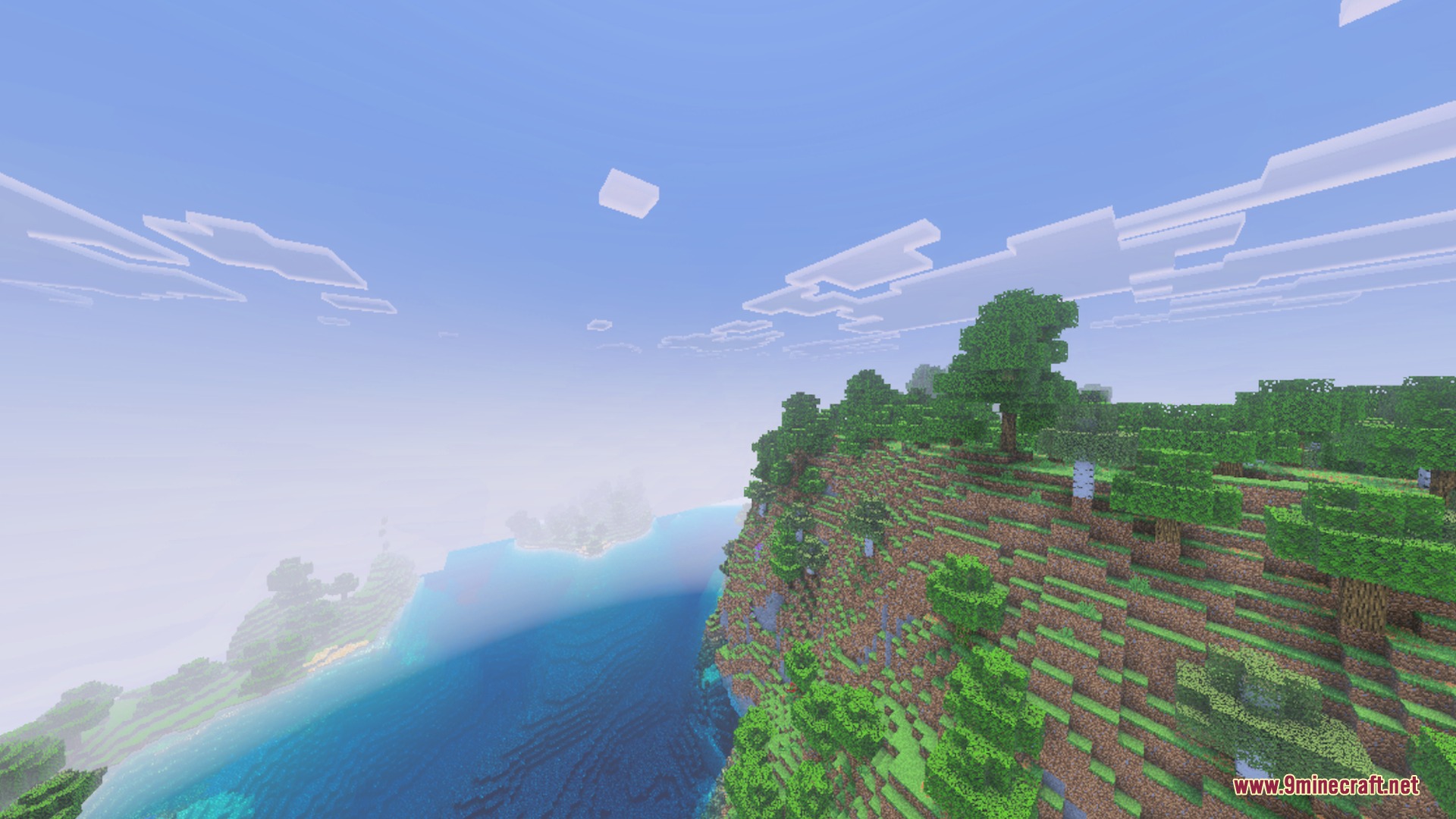 Stylista - Vibrant Visuals & RTX Shader Screenshot 7 A high angle view of a grassy cliff overlooking the deep blue ocean