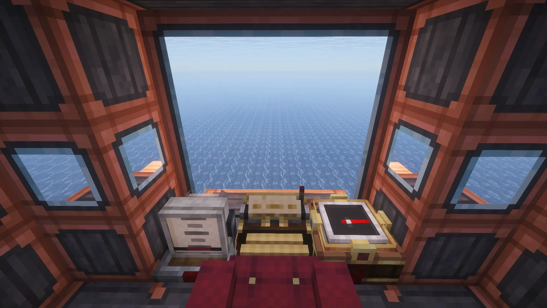 The cockpit of the Submarine V2 looking out at the vast blue ocean