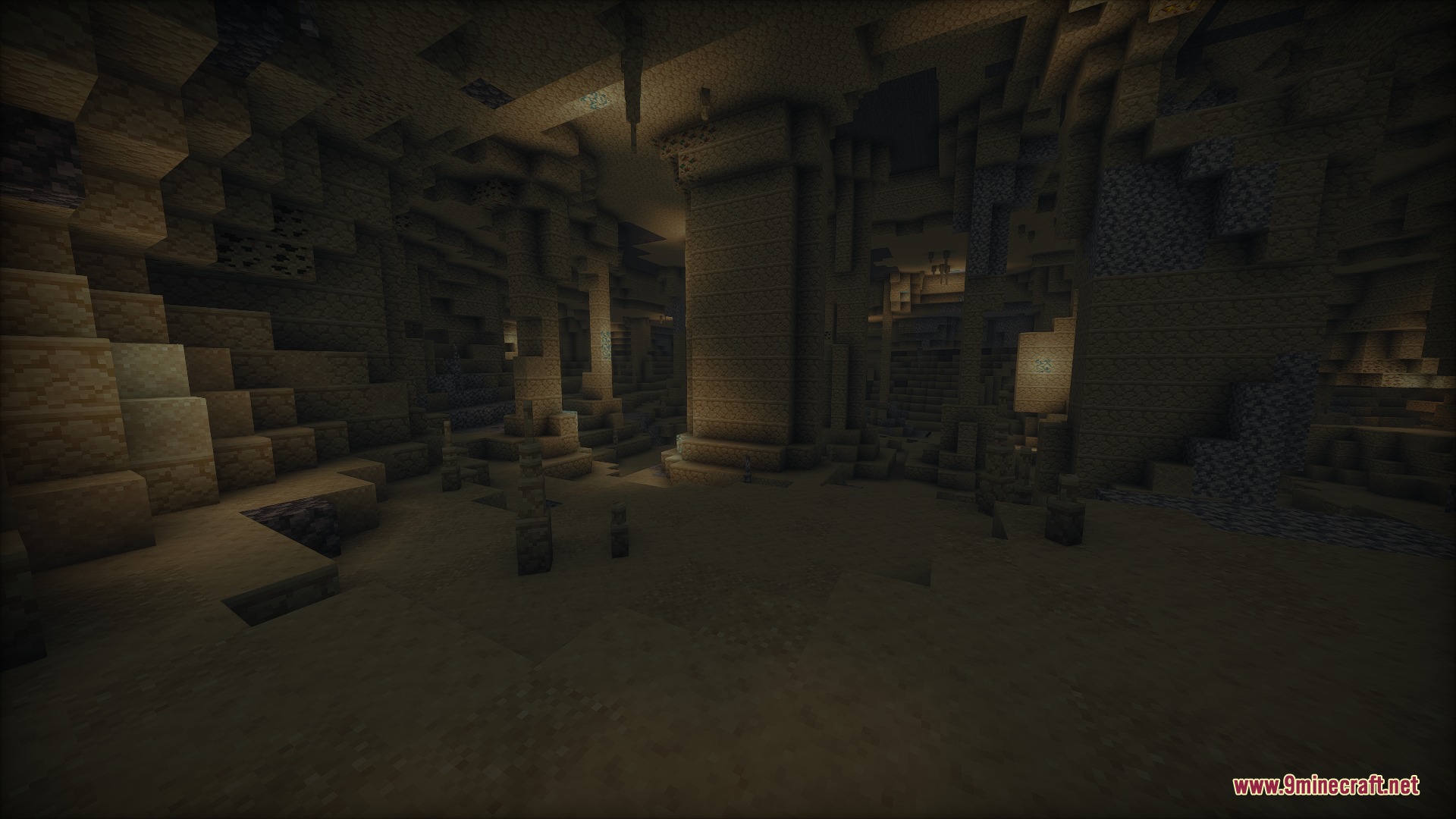 Subterranean Expansion Cave Update Mod Screenshot 4 Large desert cave with sandstone pillars and stalactites hanging from the ceiling