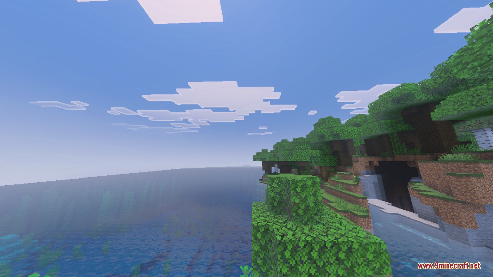 Sun & Moon Path Shader Screenshot 1 A scenic cliffside view of the ocean with realistic sky lighting effects