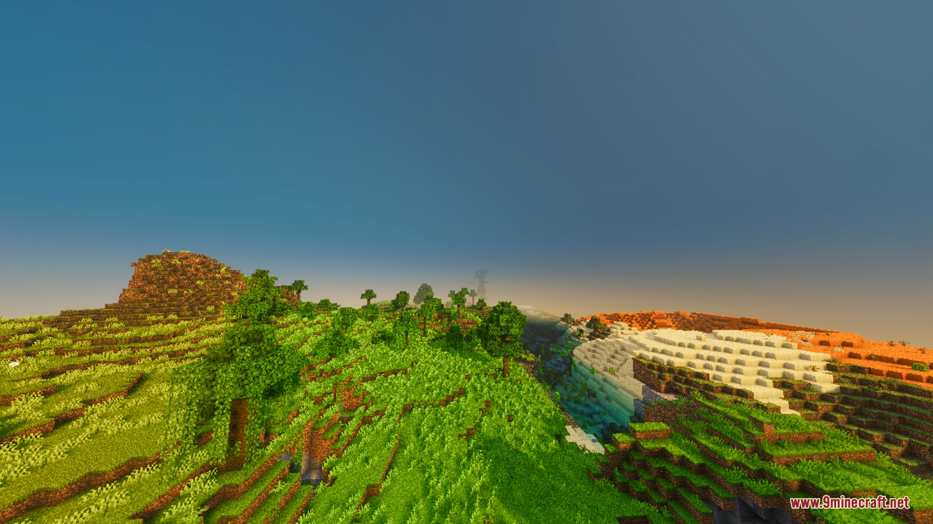 Sunglid Visuals Shader Screenshot 9 Lush green hills meeting a sandy desert under warm golden Minecraft sunlight