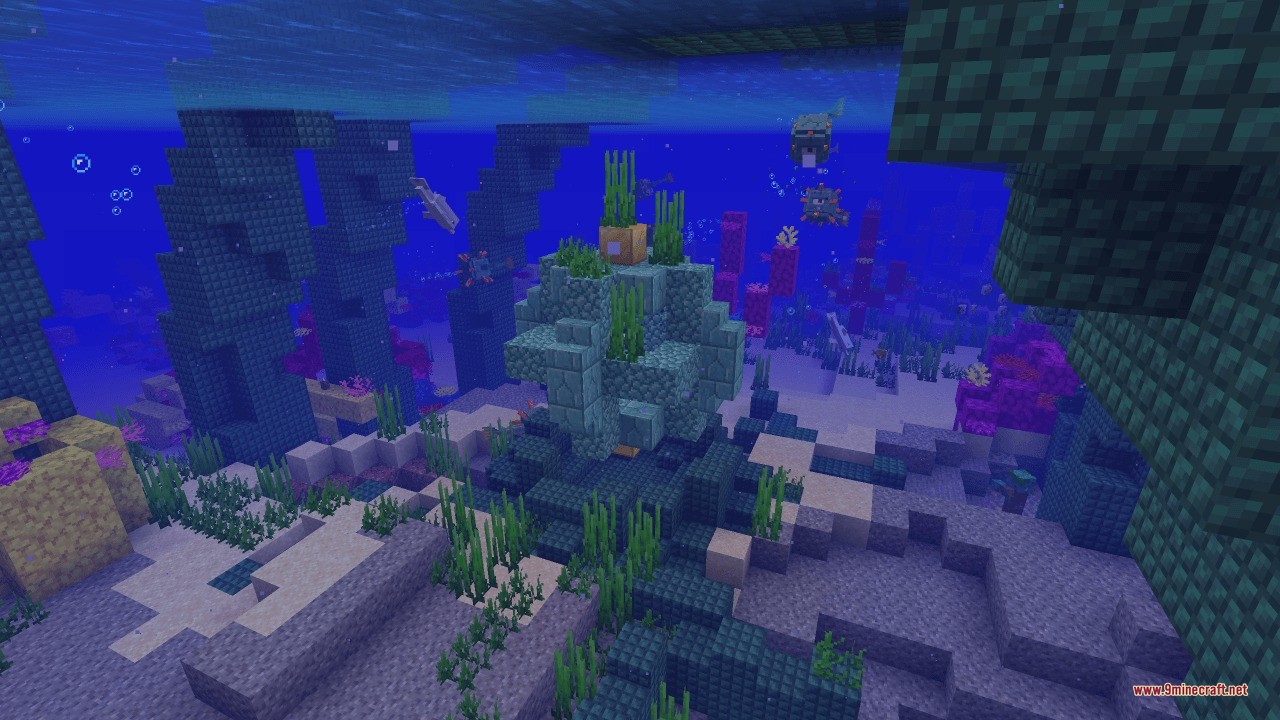 Small prismarine ruins with seagrass located near a colorful coral reef biome