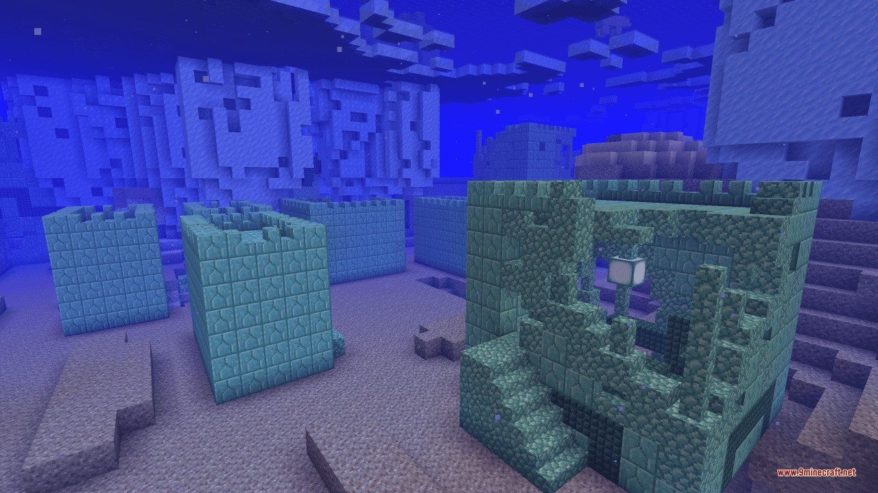 Ruined prismarine buildings forming a sunken city deep on the sandy seabed