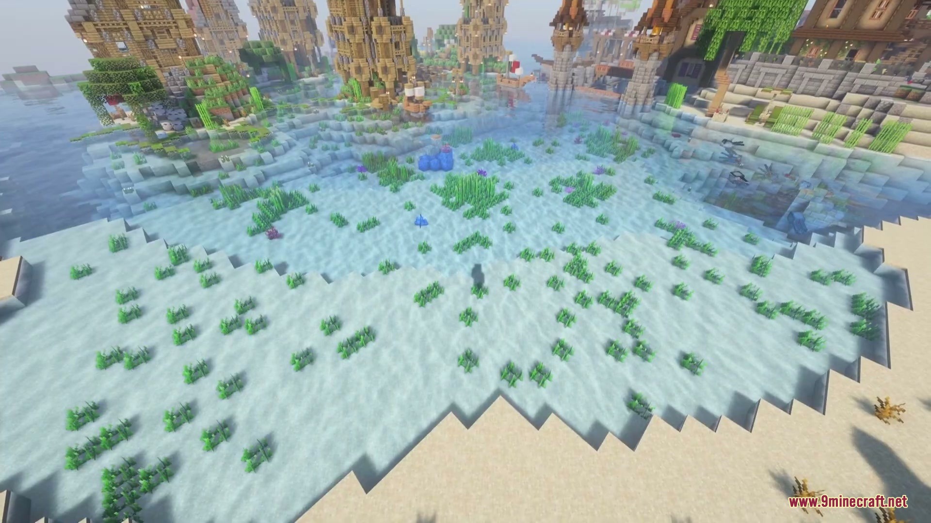 Sunken Topography Mod Screenshot 3 Shallow clear water reveals seagrass and sand near a coastal village settlement