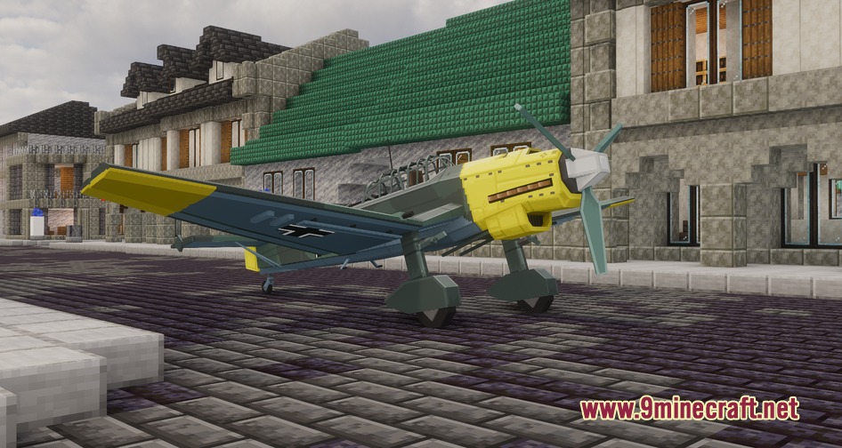 A German dive bomber plane parked on a cobblestone street in Minecraft