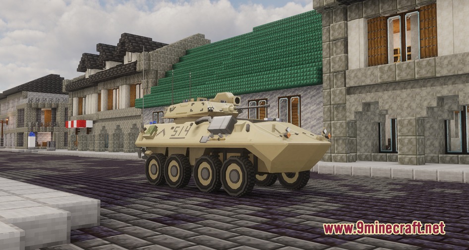 A tan eight wheeled armored vehicle parked on a cobblestone city street