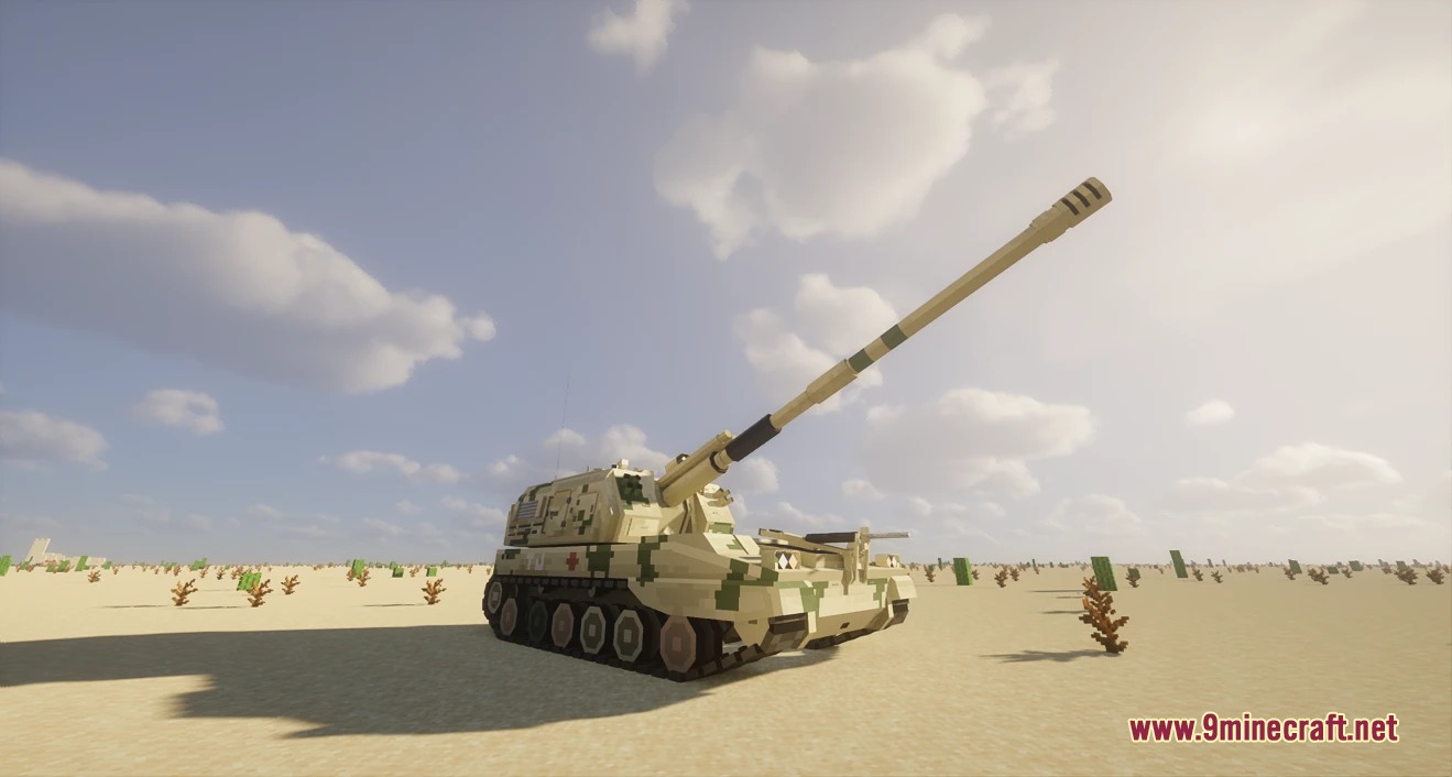 A desert colored artillery vehicle with a long barrel pointing upwards