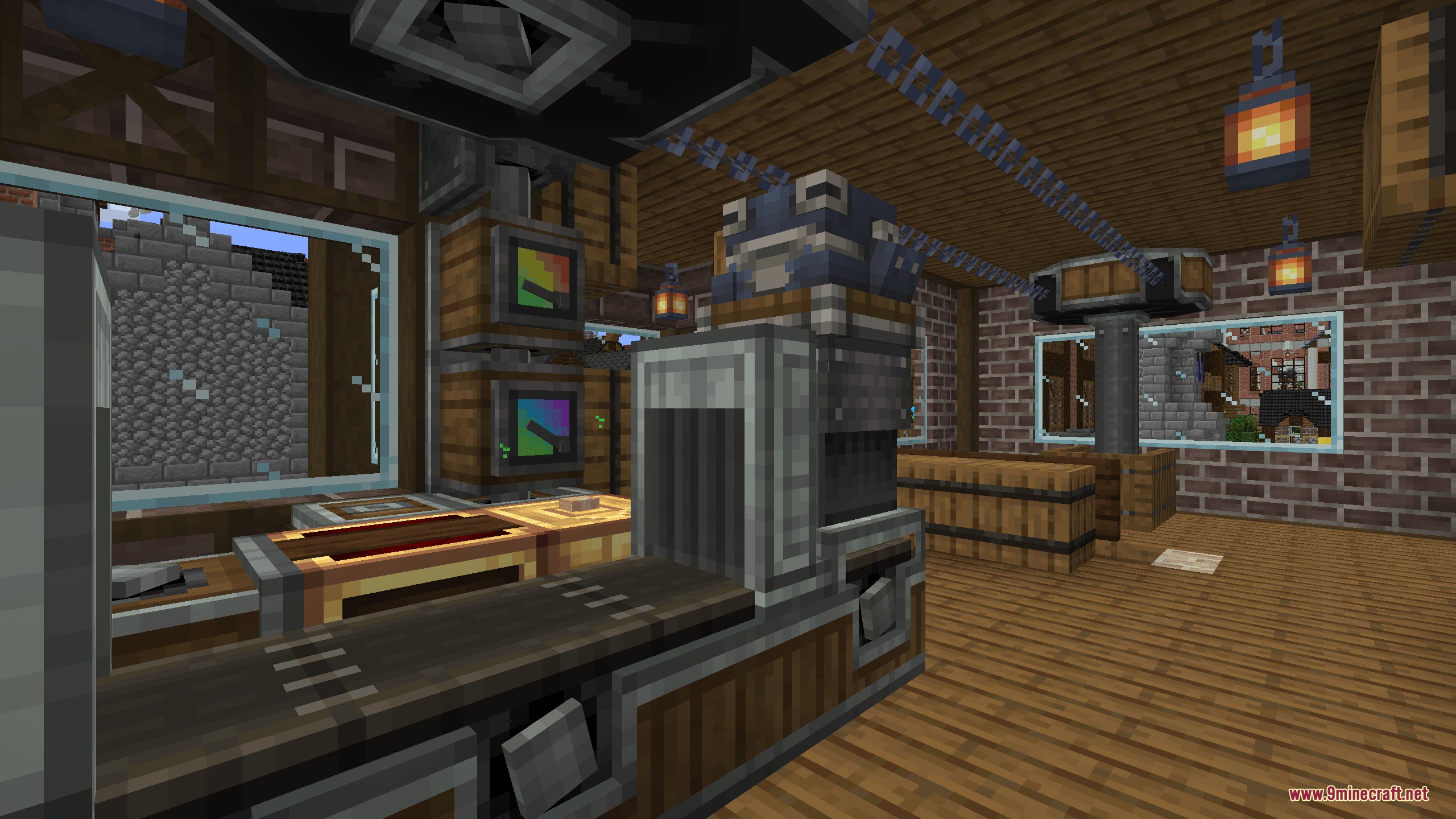 Automated production line with conveyor belts and mechanical components inside a workshop