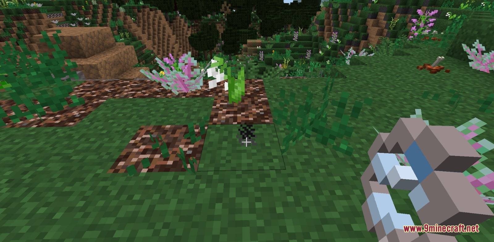 TFC Artisanal Mod Screenshot 7 Player holding a magnifying glass to start a fire in TFC Artisanal Mod